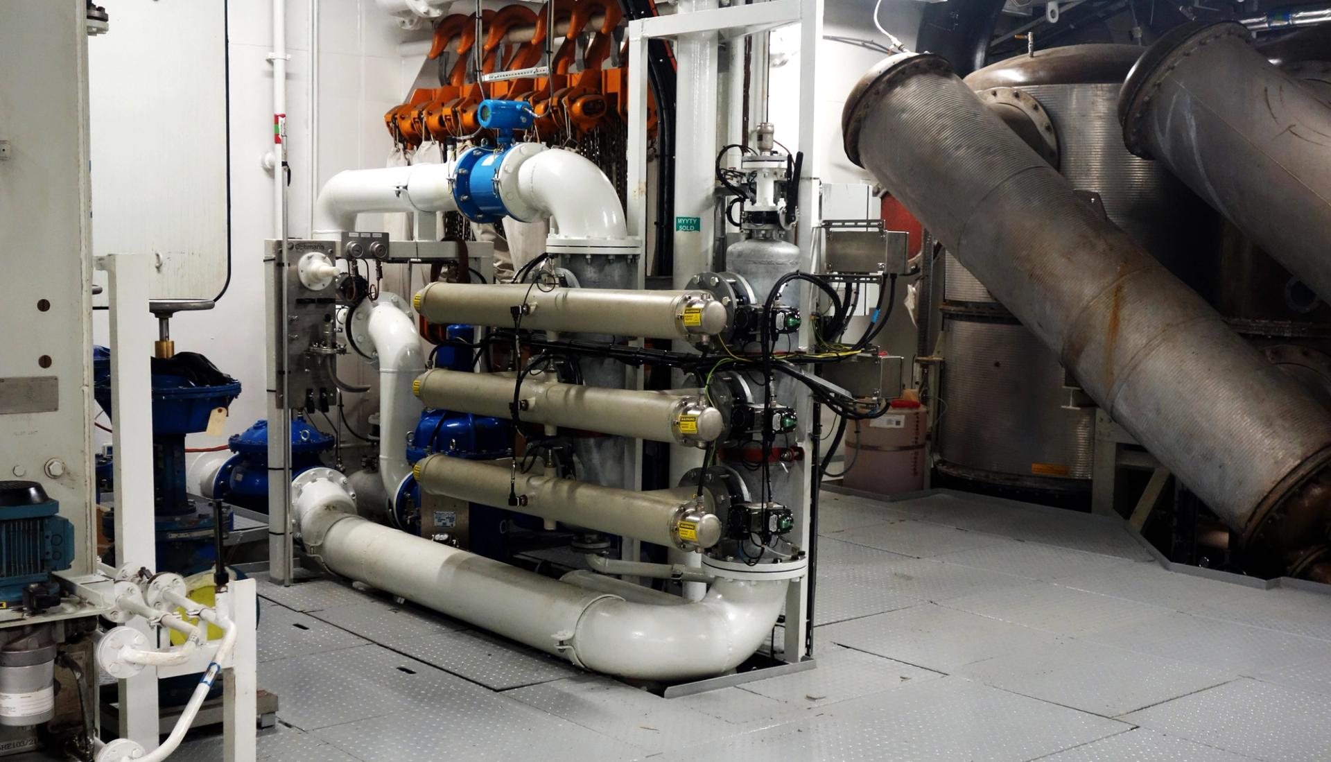 Close up of a ballast water treatment system inside a ship