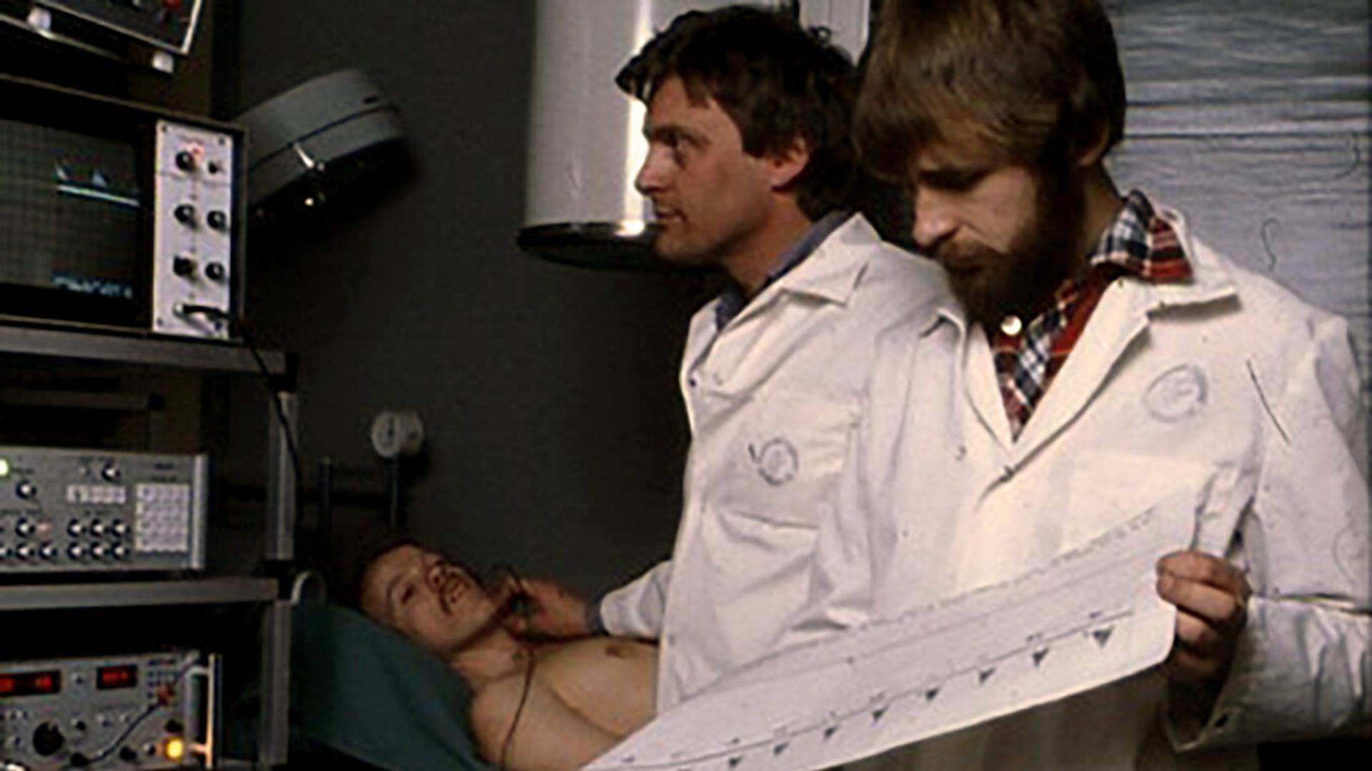 Doctors using instruments