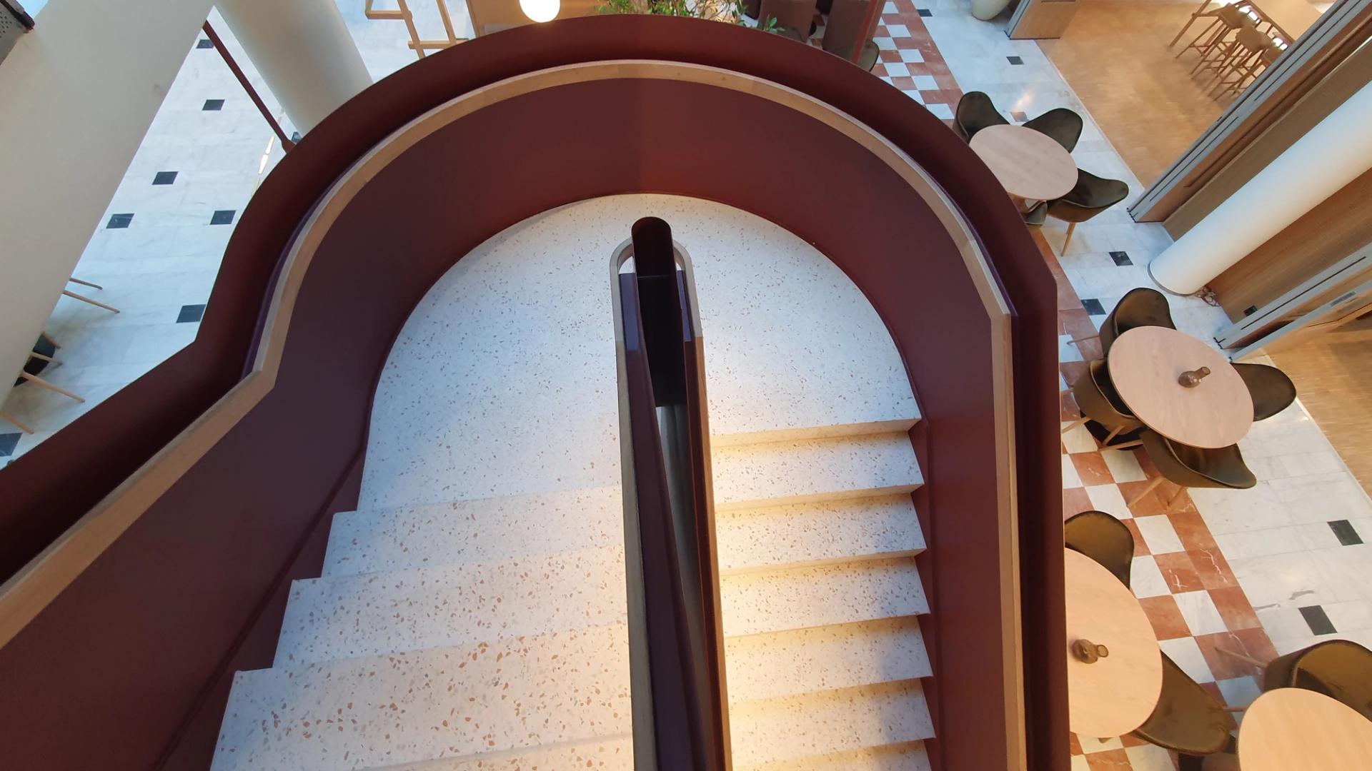 View from the top of spiral staircase made of terrazzo