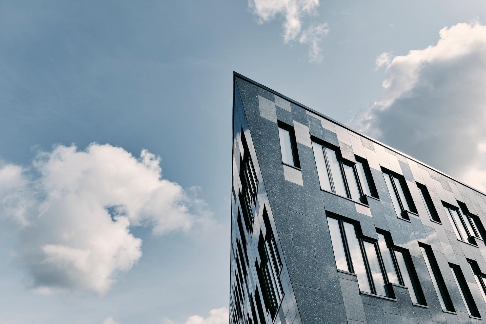 Building covered in grey tiles from Norwegian stone