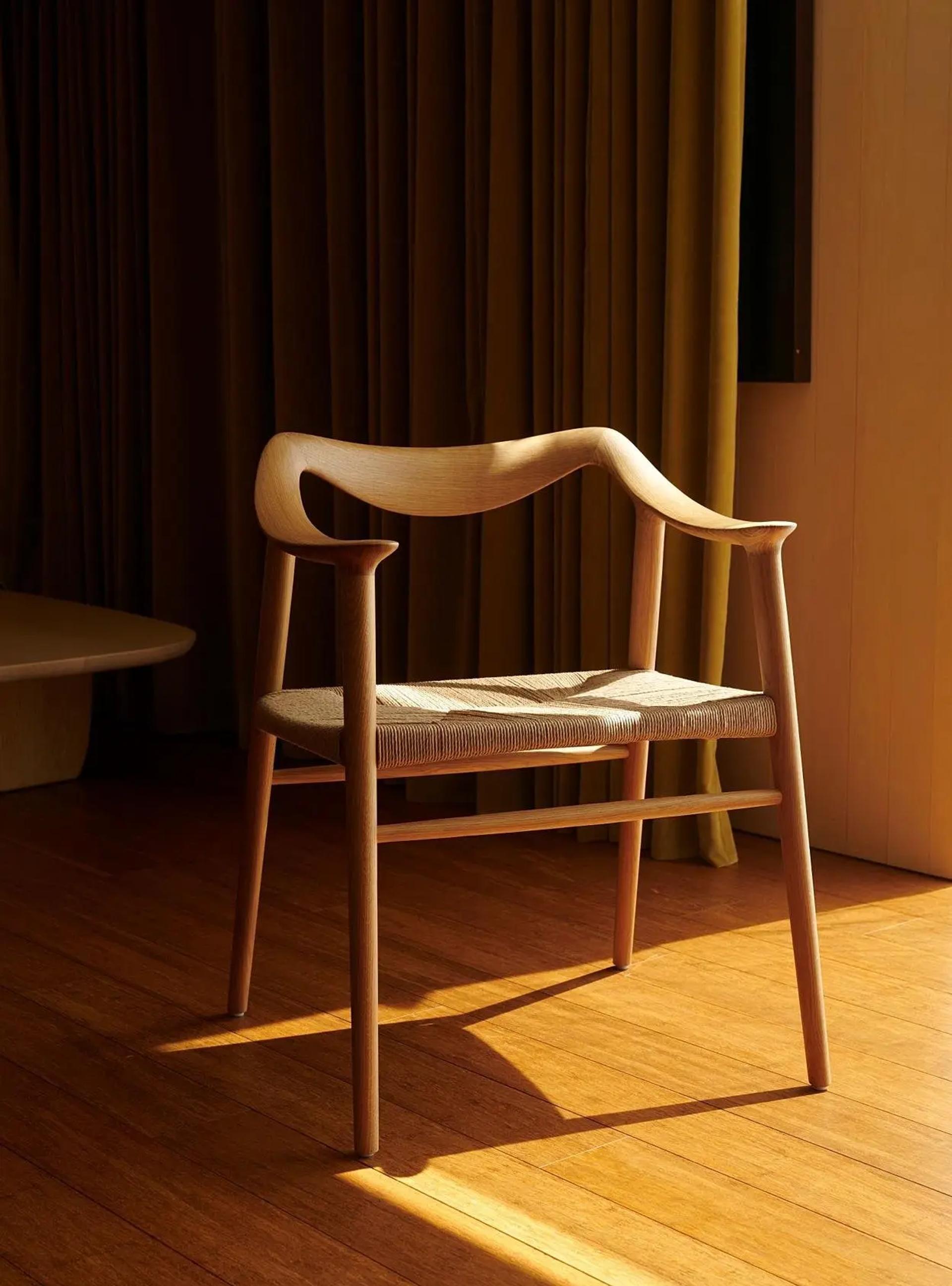 Wooden chair with a woven seat