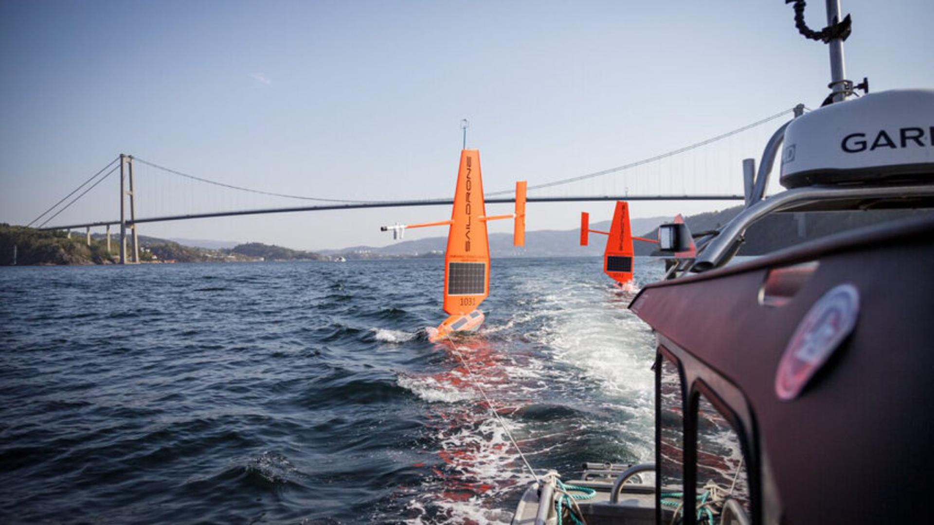 Drones behind boat