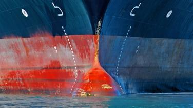 Two ships' bows meeting