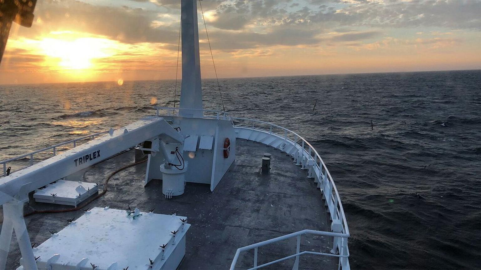 Front of ship in sunset