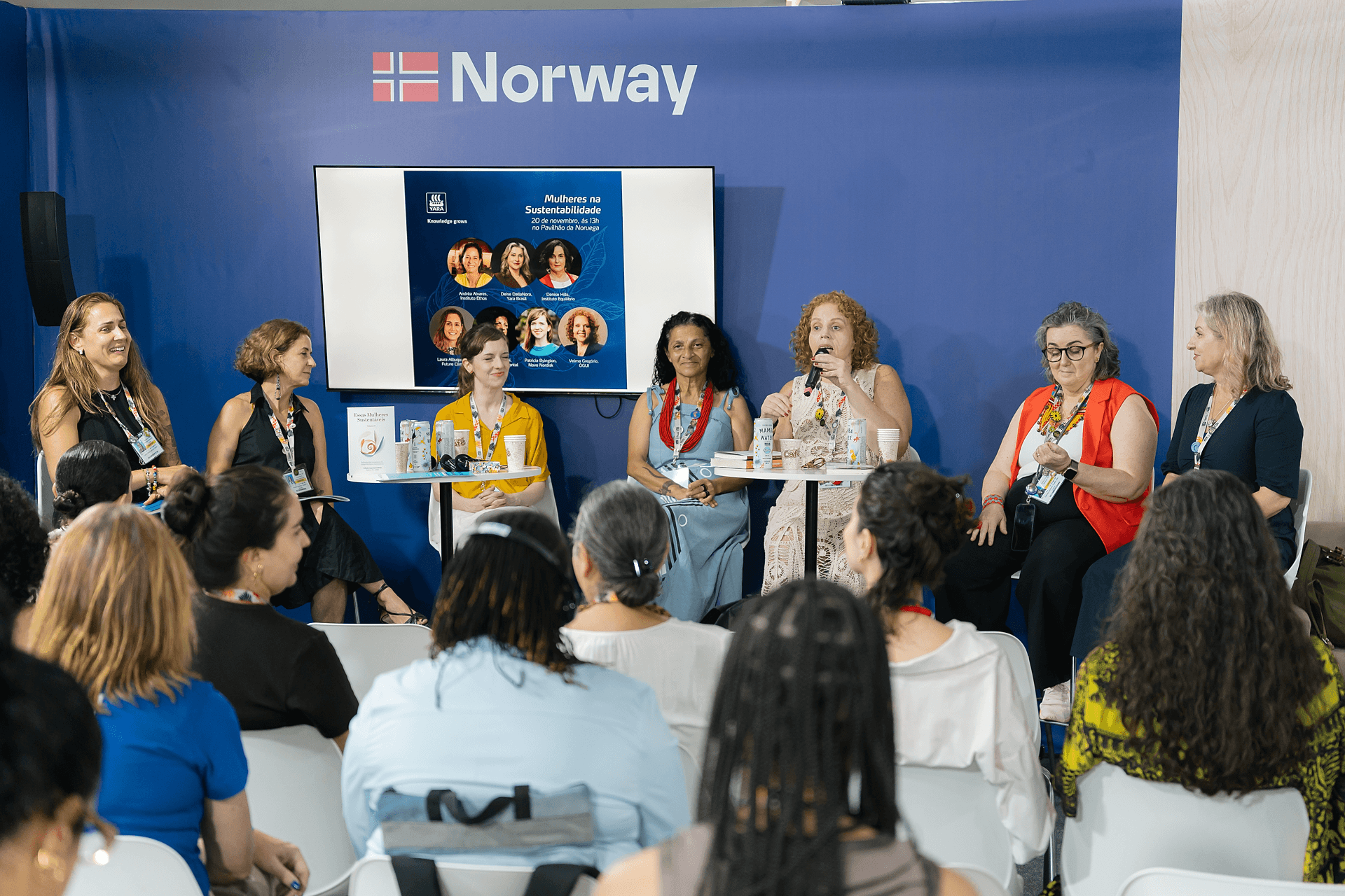 People talking on stage
