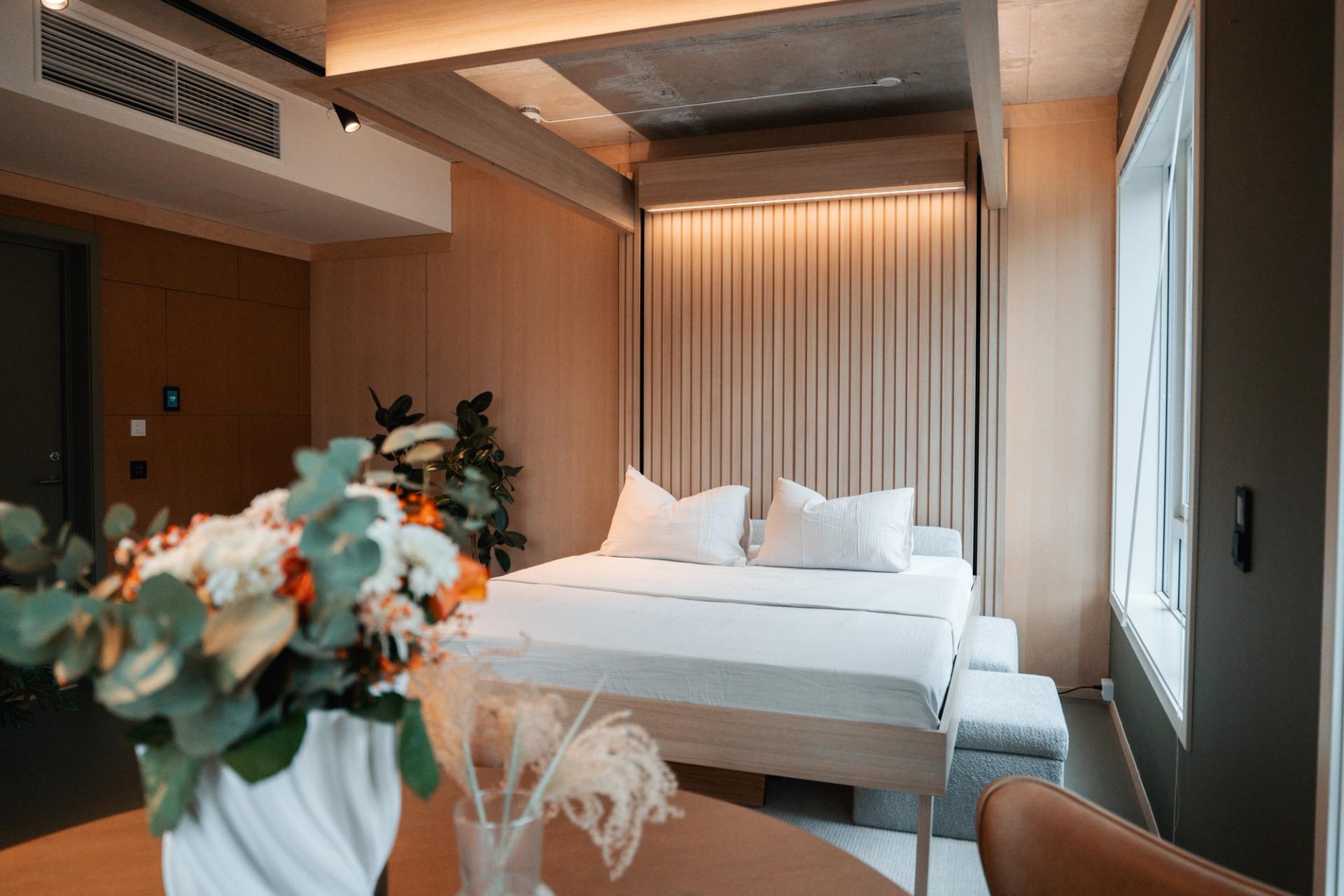 Automated ceiling bed made up on the floor