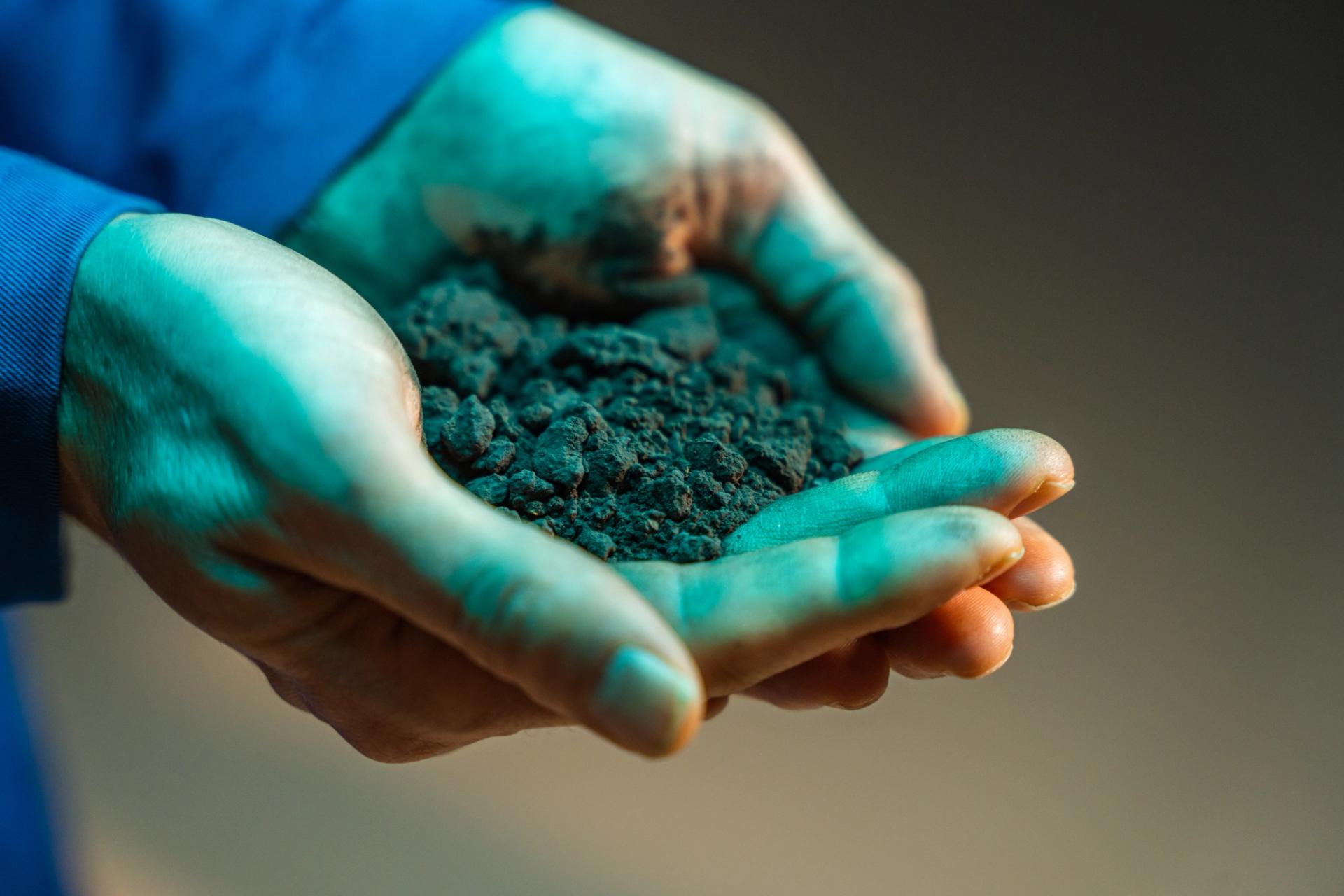 Hands holding silicon nano particles