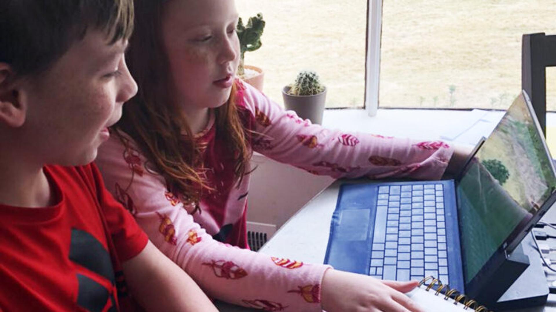Kids using computer for school