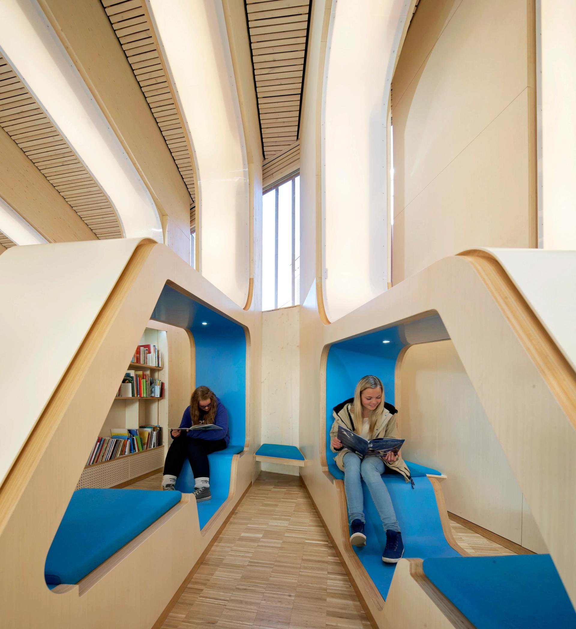 girls reading in Vennesla Library in Norway