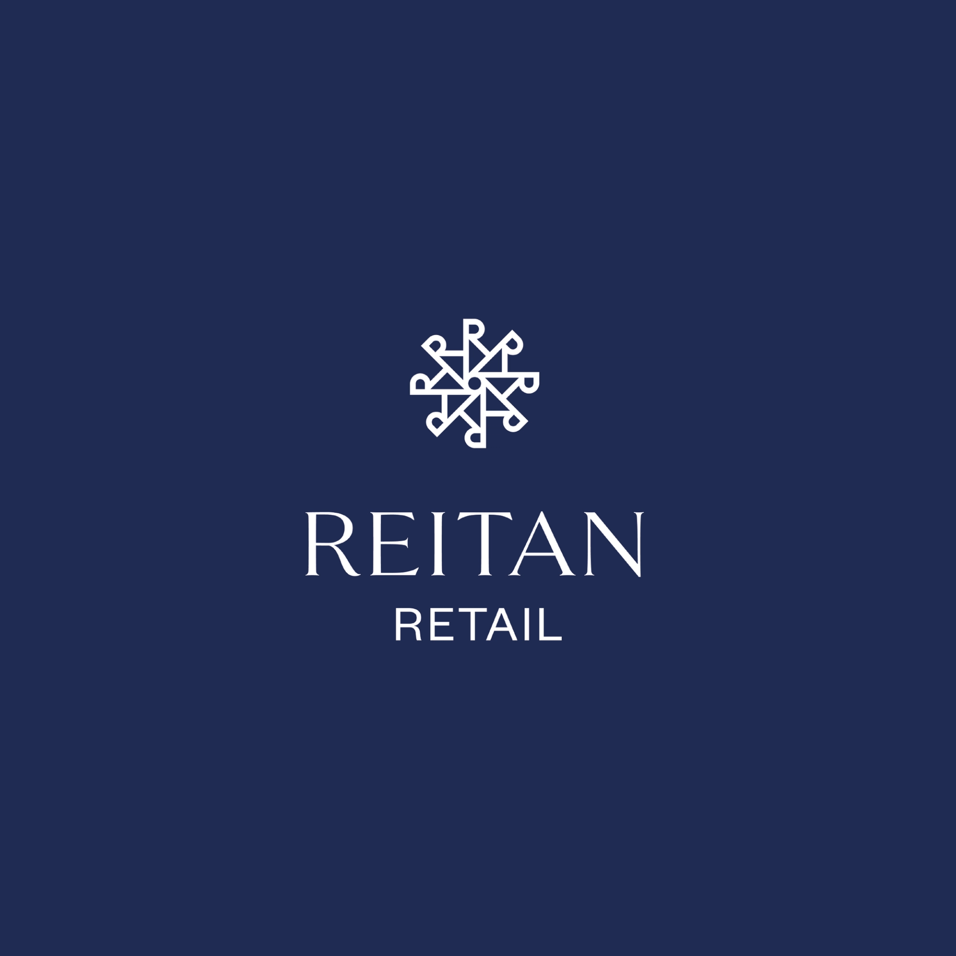 Reitan white logo