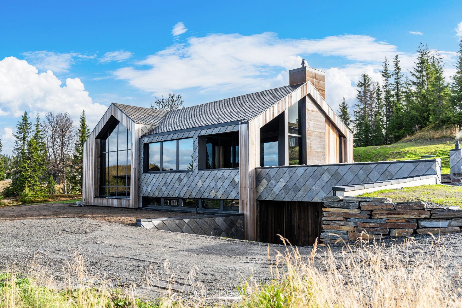 Modern cabin covered in slate tiles
