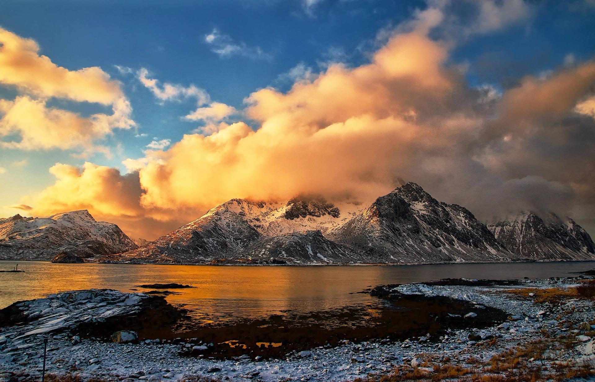 Nature picture, of a beautiful sunset over the ocean and mountain.