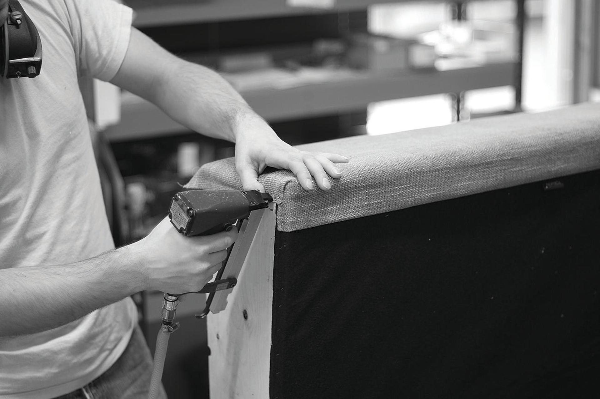 A man building a chair.