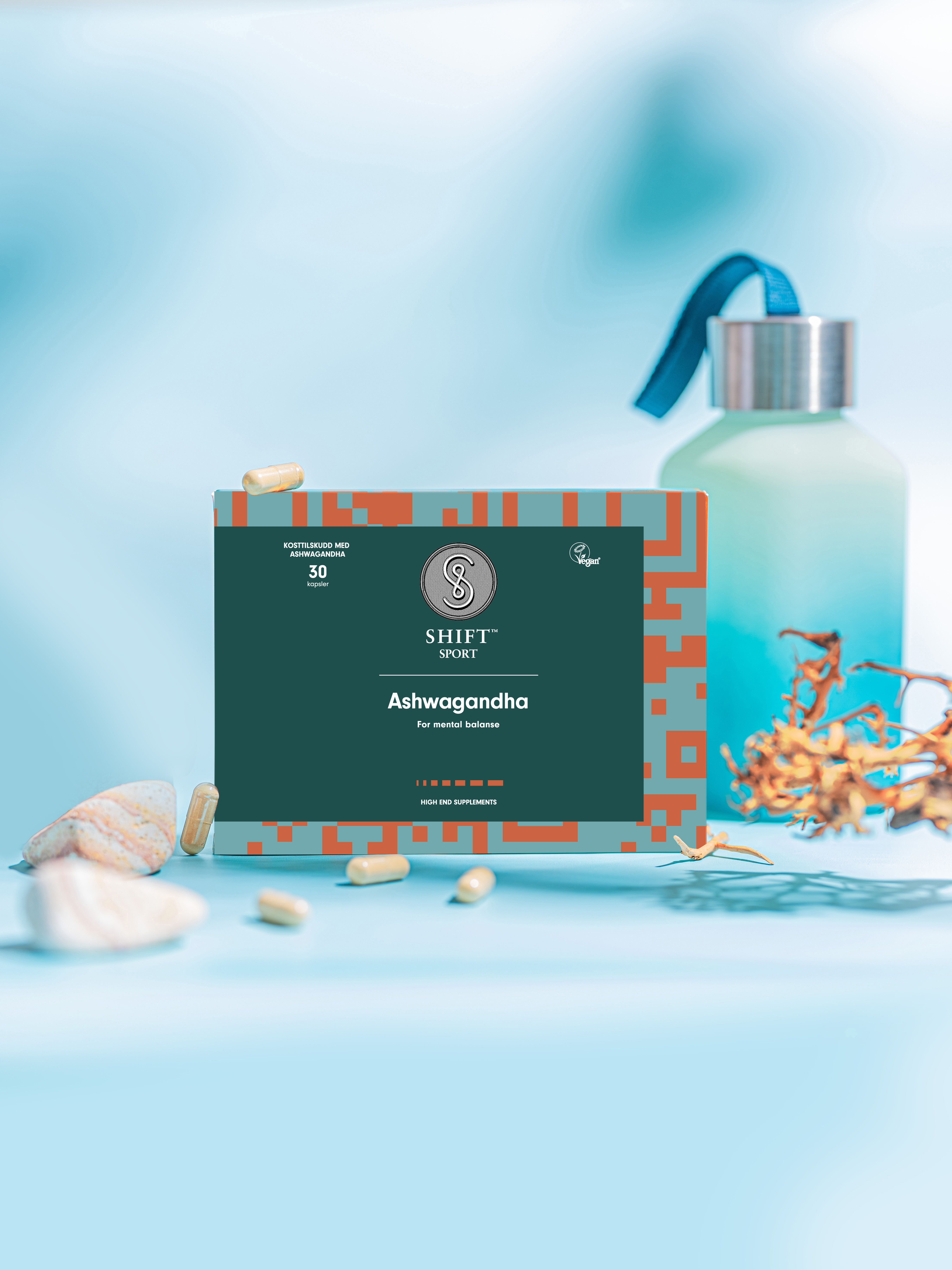 A box of Ashwagandha pills with a blue background.