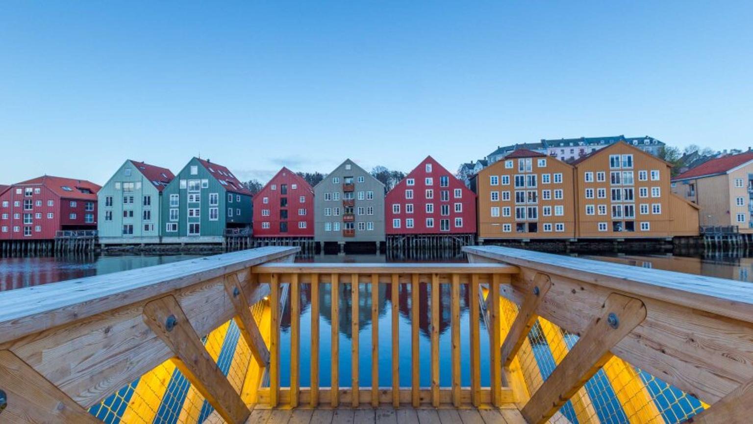 Pier in Trondheim. Multiple wooden buildings lined up