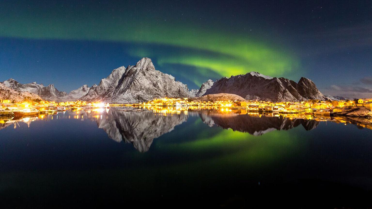 Northern lights over mountains