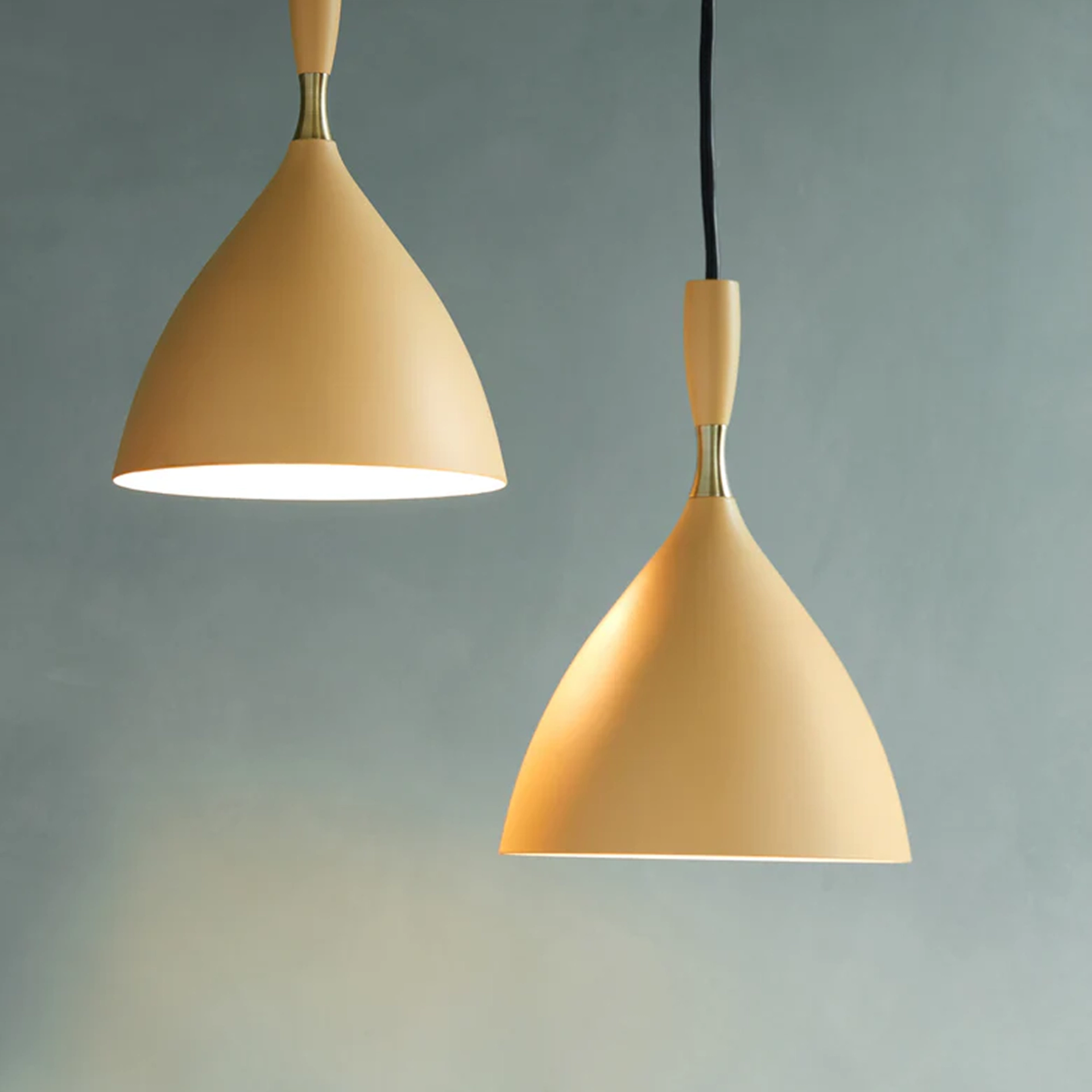 Two organic looking pendant lamps in beige