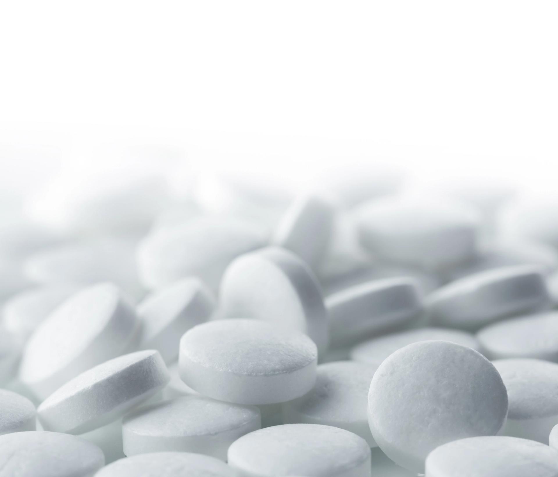 Pile of white calcium tablets