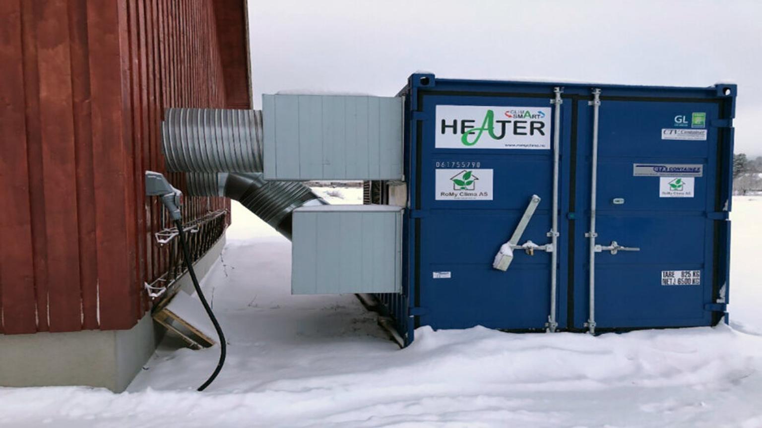 Industrial heater in a blue metal container