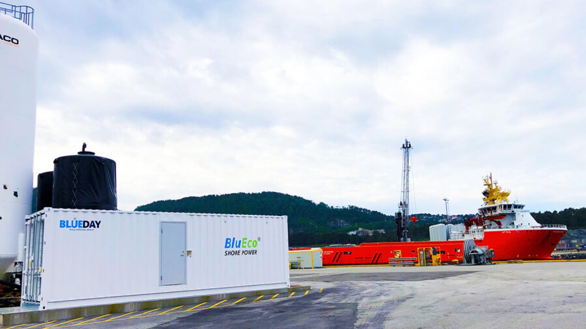 A picture from the marina, of a ship and Blueday Technology container.