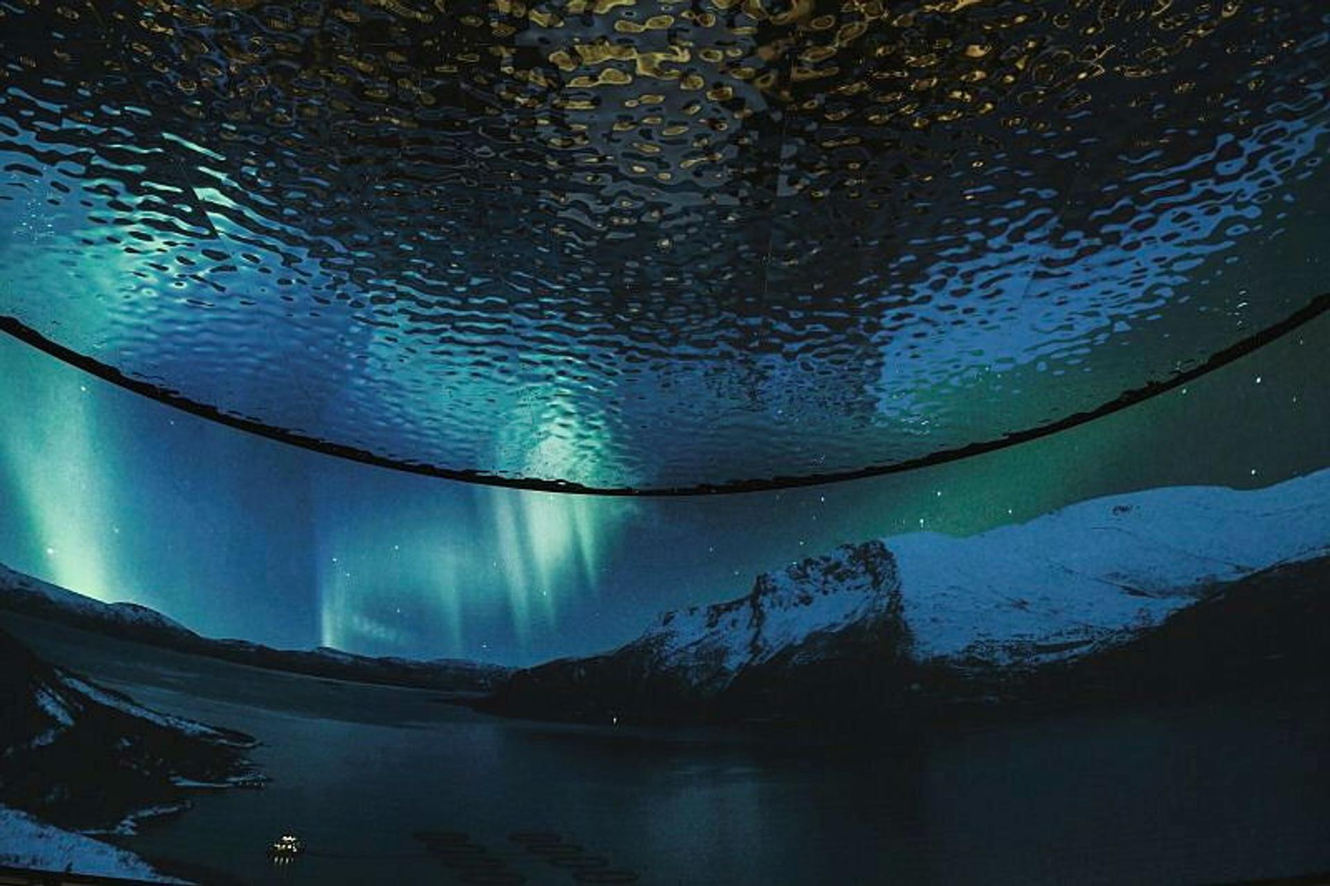 Picture of Norwegian nature and northern lights.