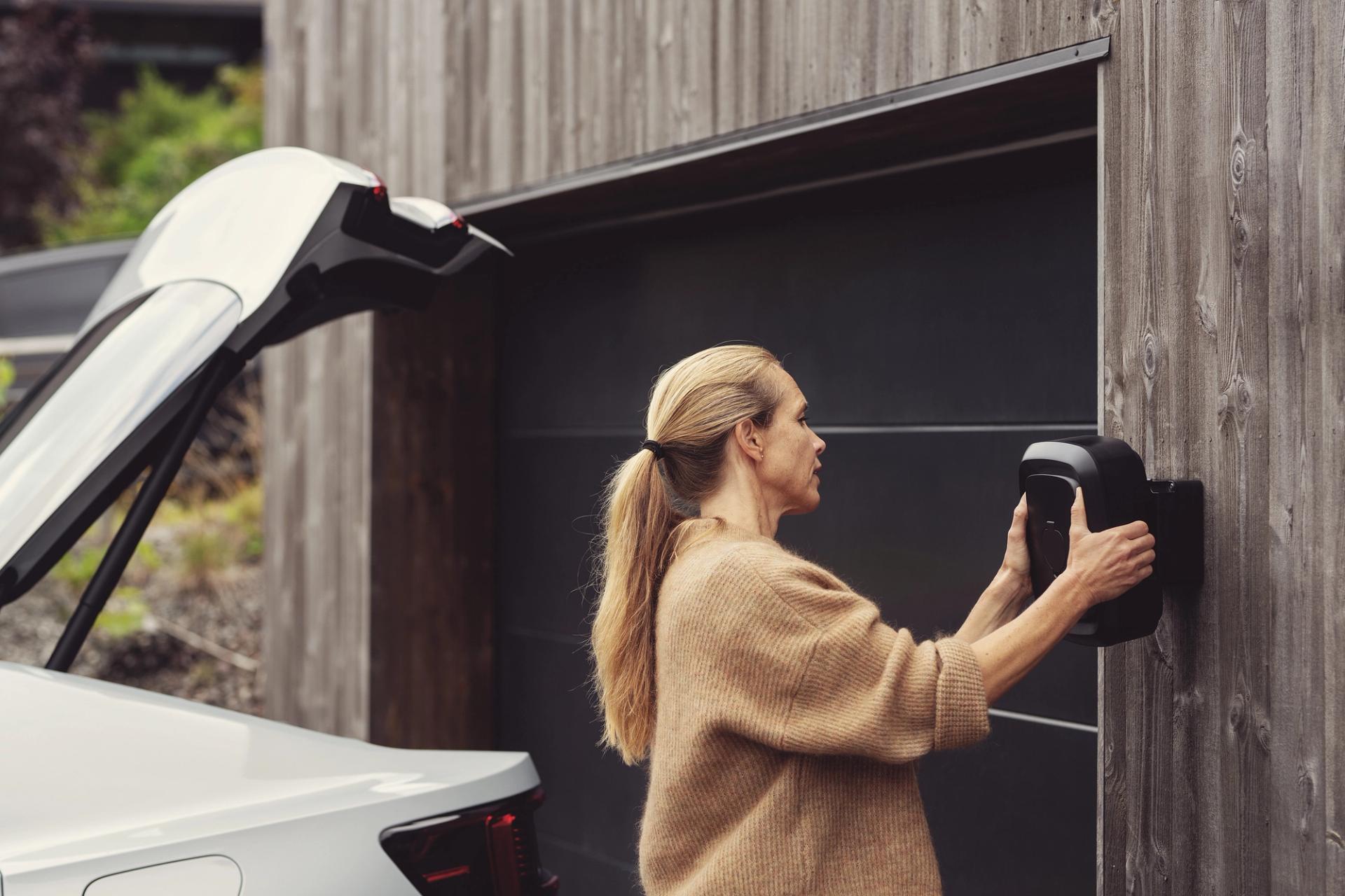 Woman attaching Enua charger