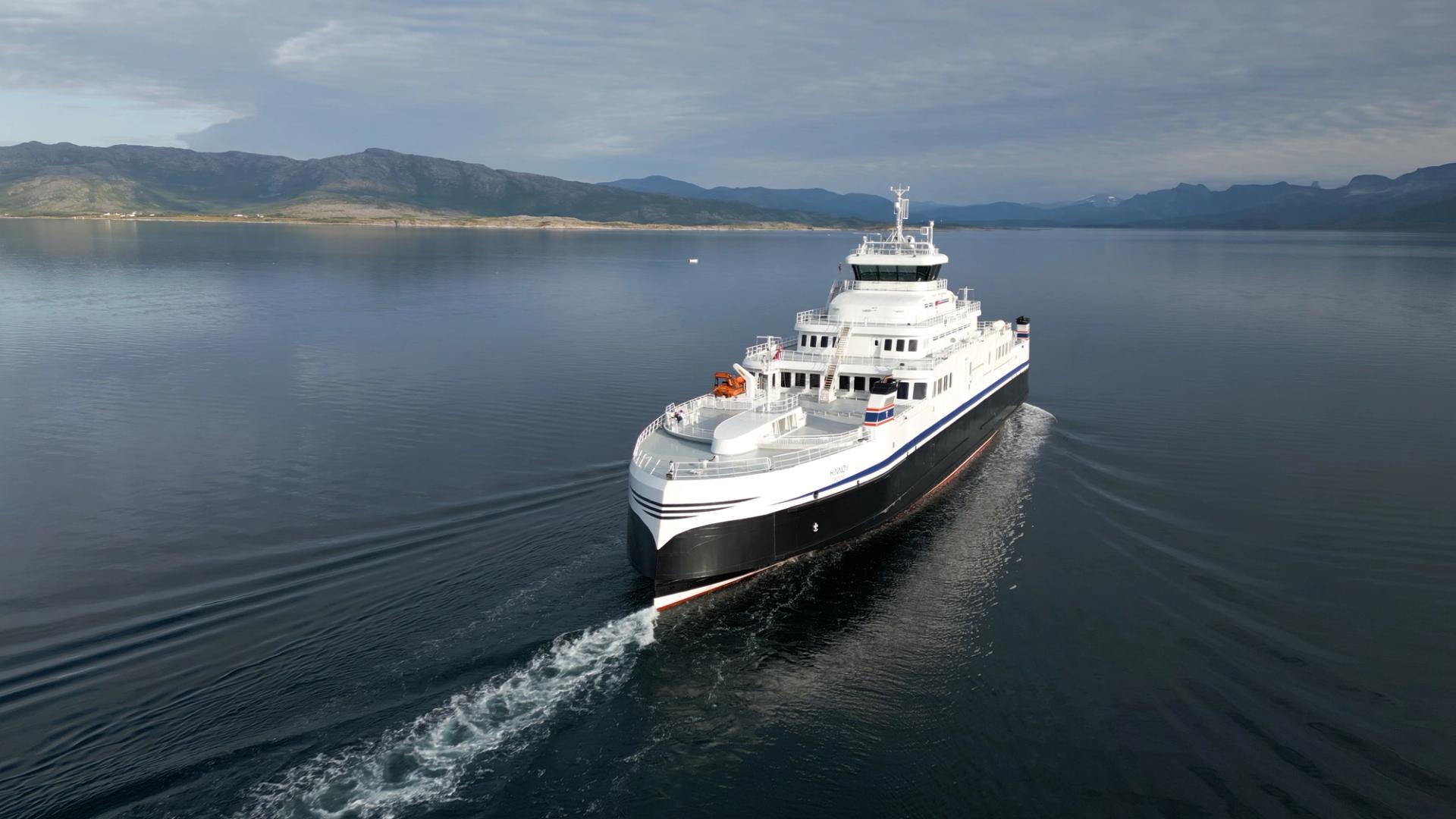 white ferry sailing in North Norway