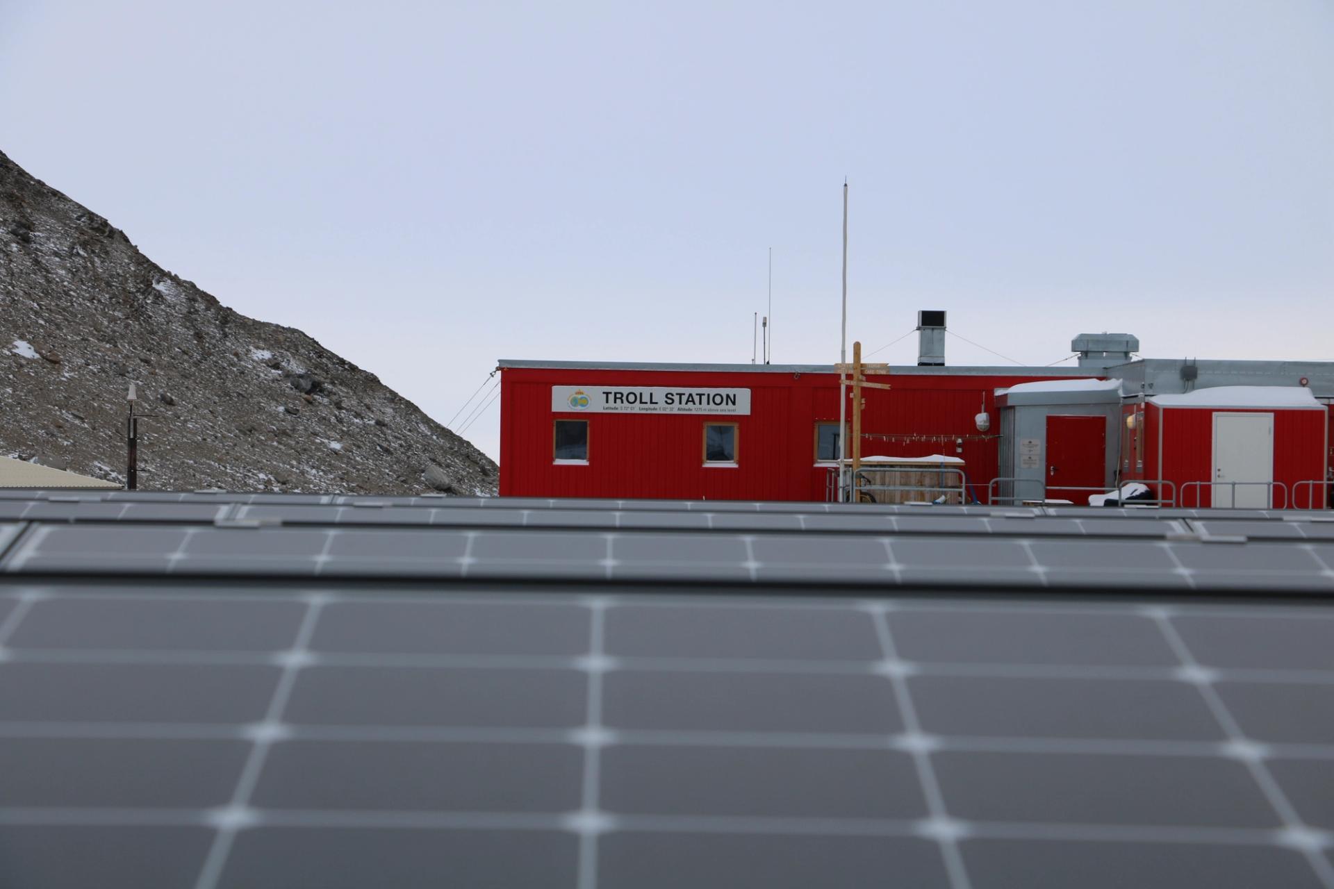 Solar panels in front of Troll, the Norwegian research station in Antarctica