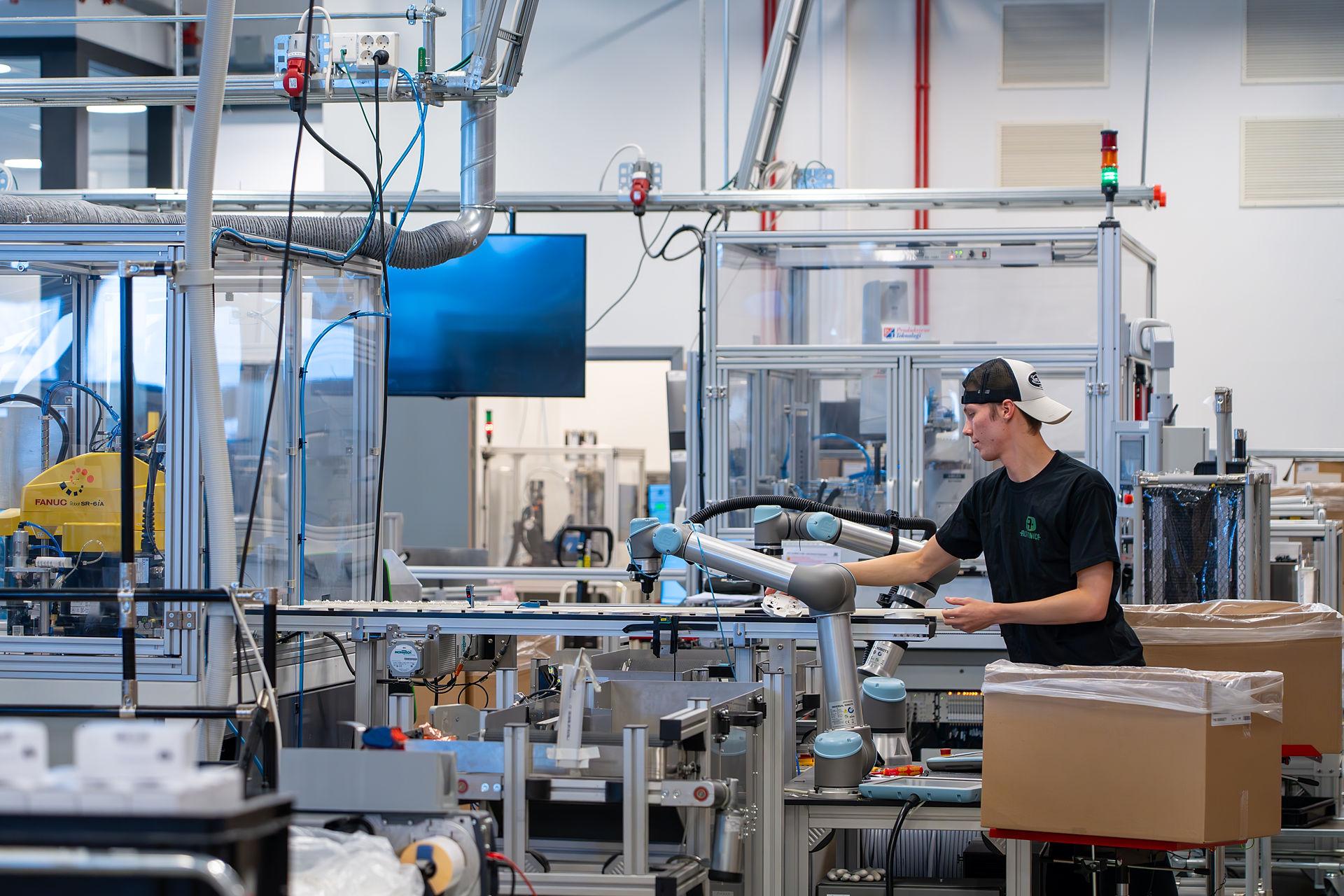 Man working in fabric manufacturing fire safety products