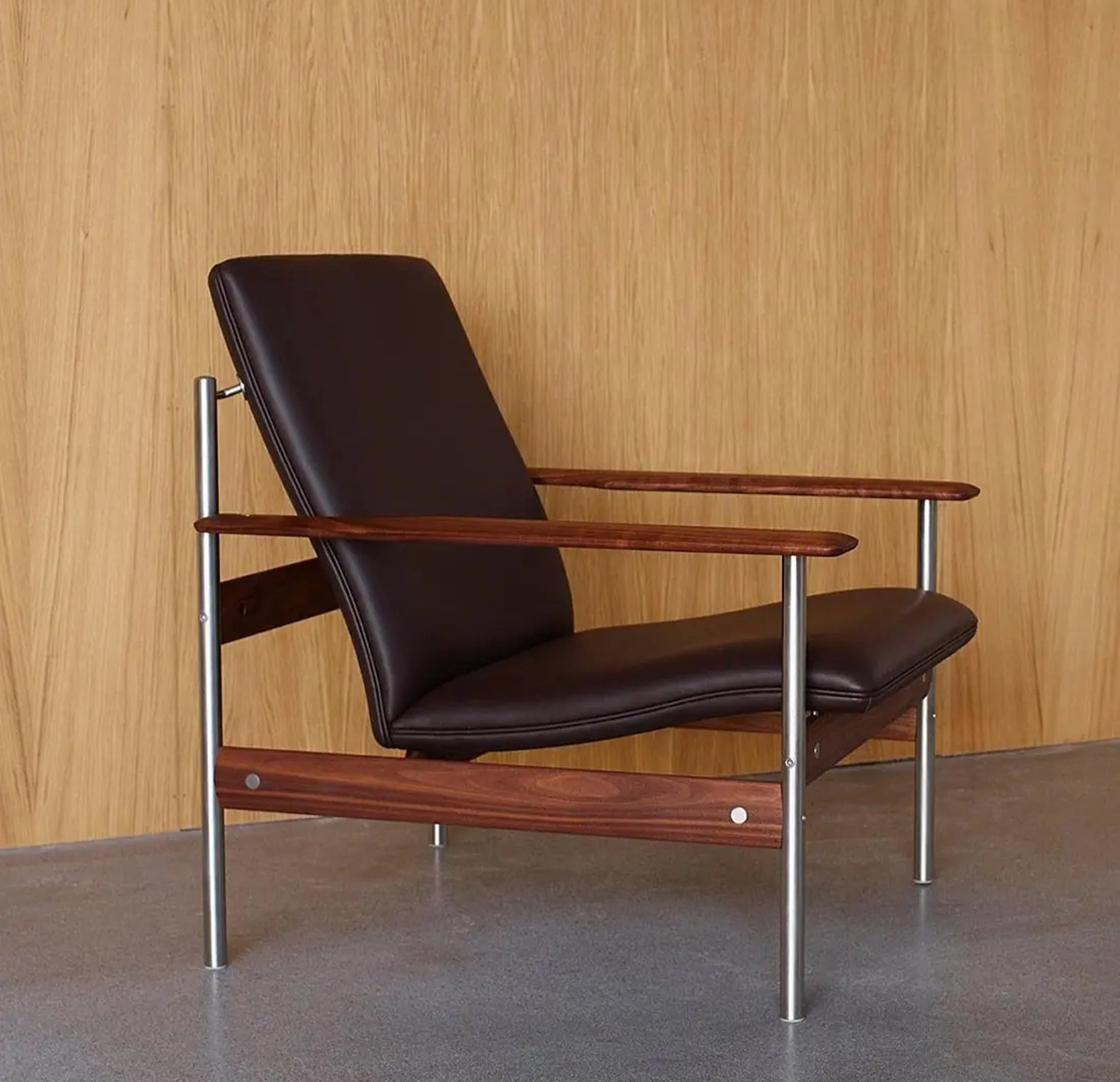 black leather and wood lounge chair