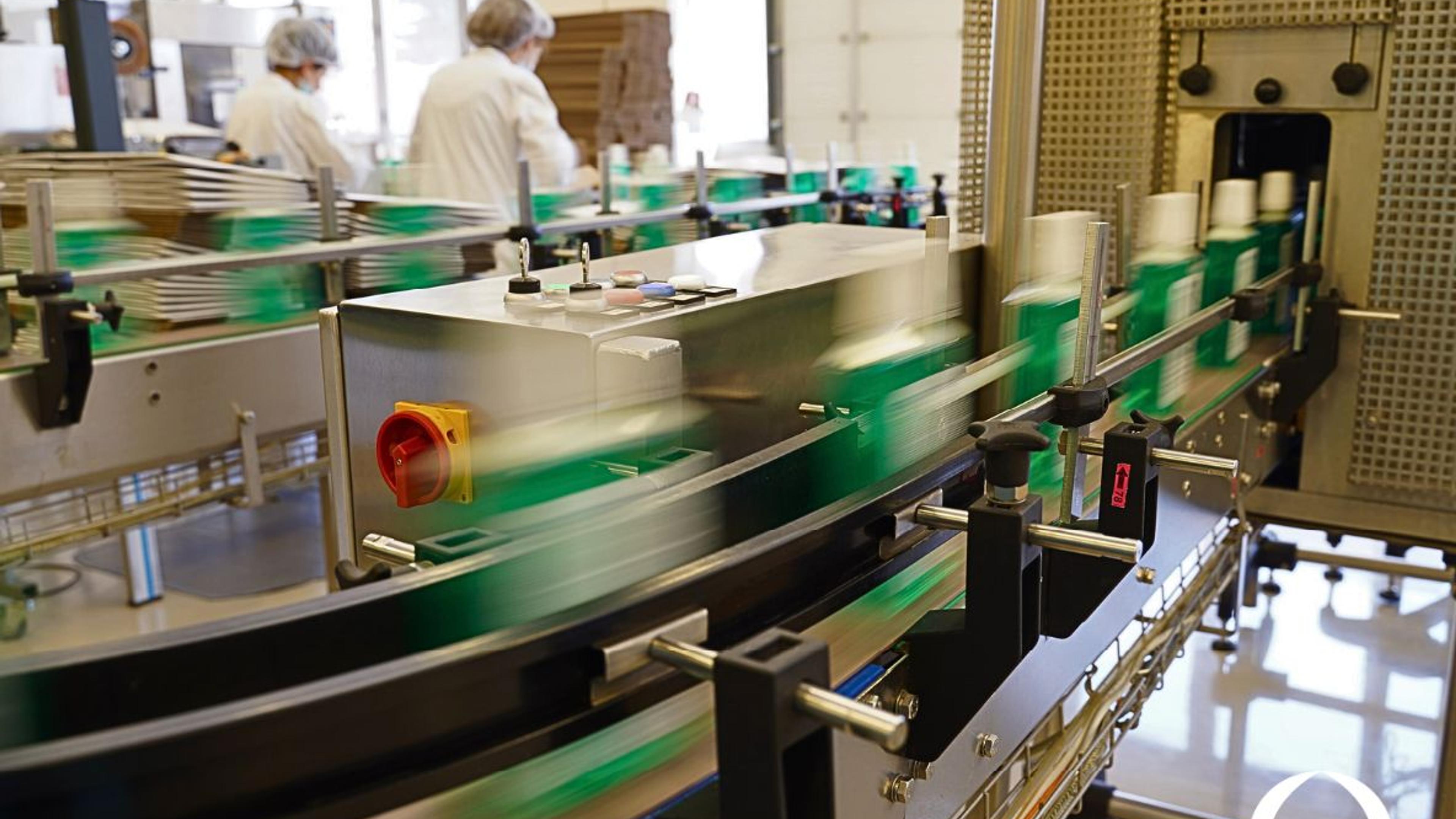 The manufacturing system at AROMA, the machineries producing the plastic bottles