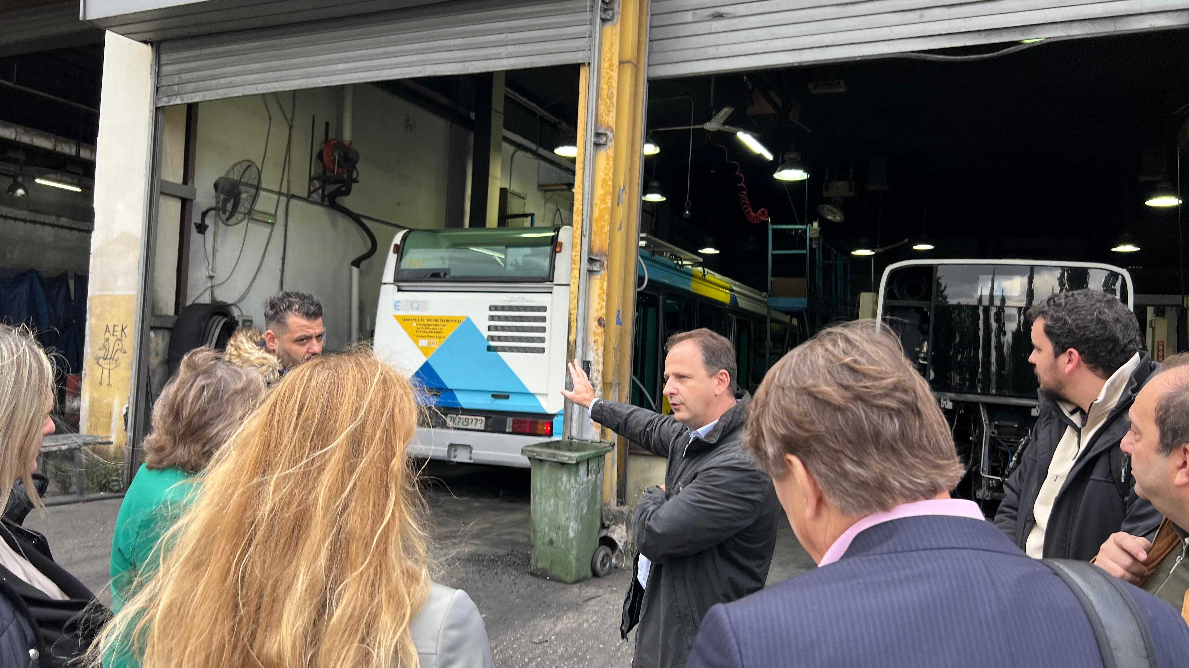 A photo of the project visit, looking at the busses