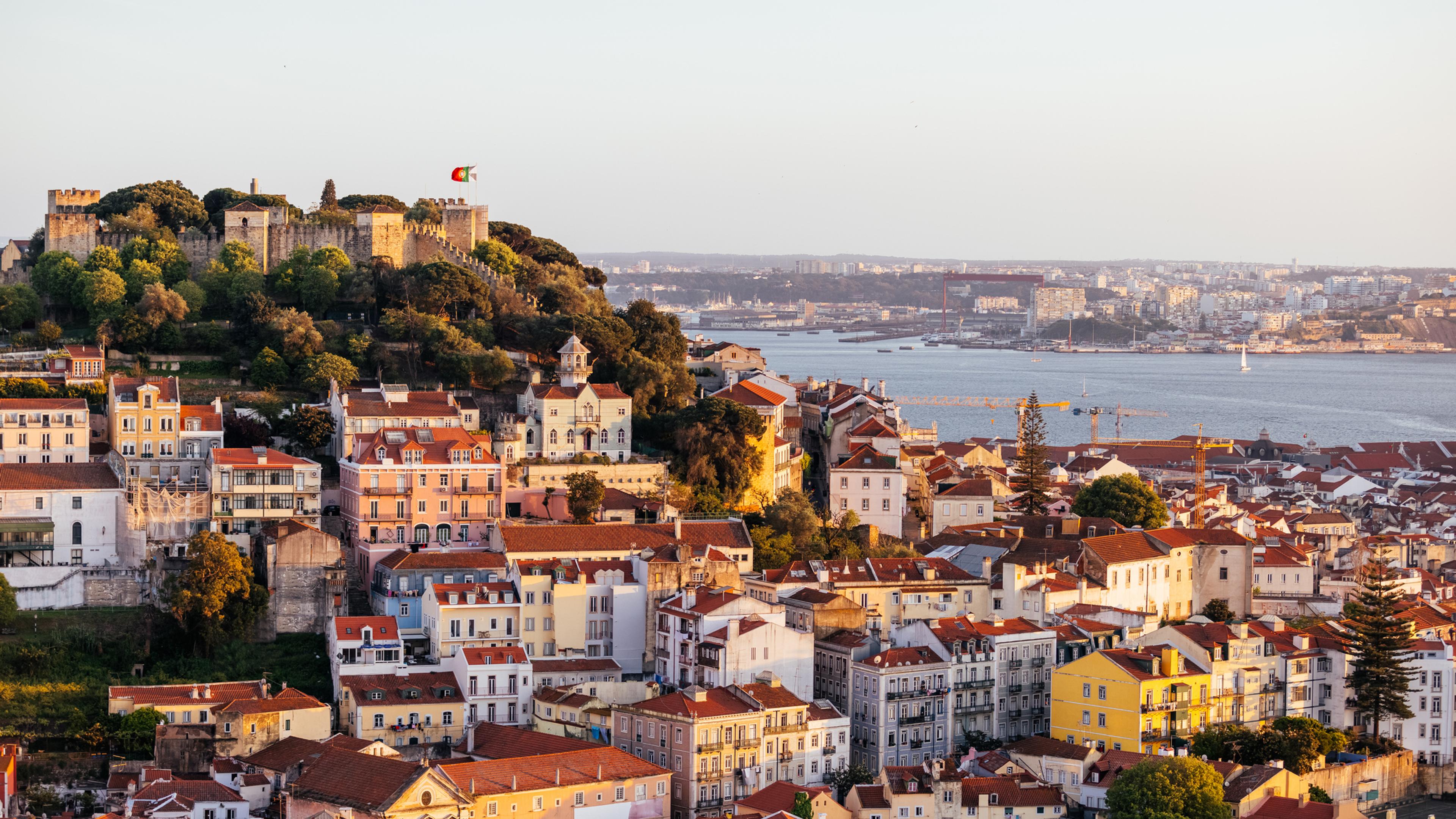 Lisbon cityscape with St. George Castle (Castelo de São Jorge) at sunset, Portugal