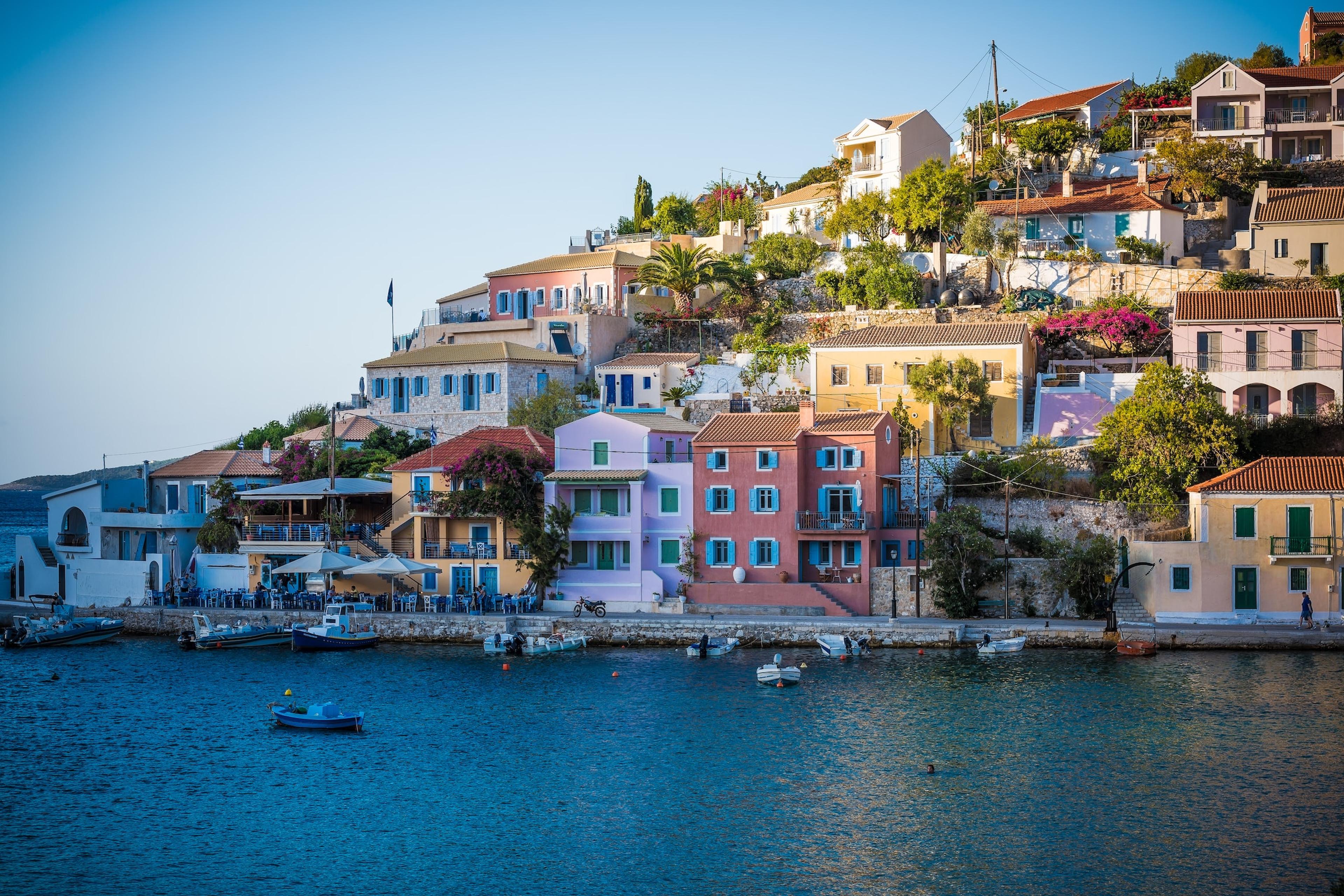 Greek town with colourful houses by the sea