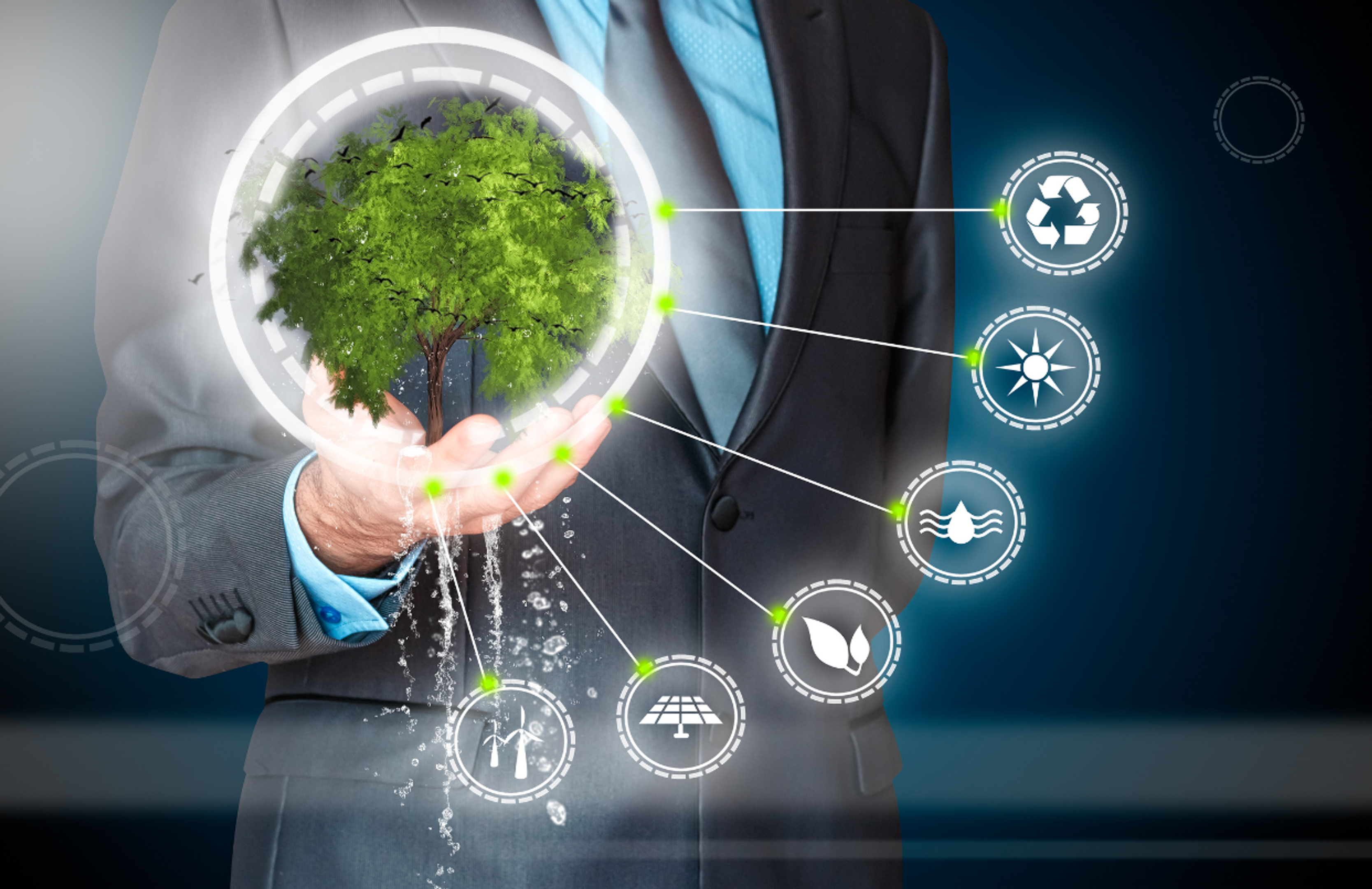 Man in suit holding tree