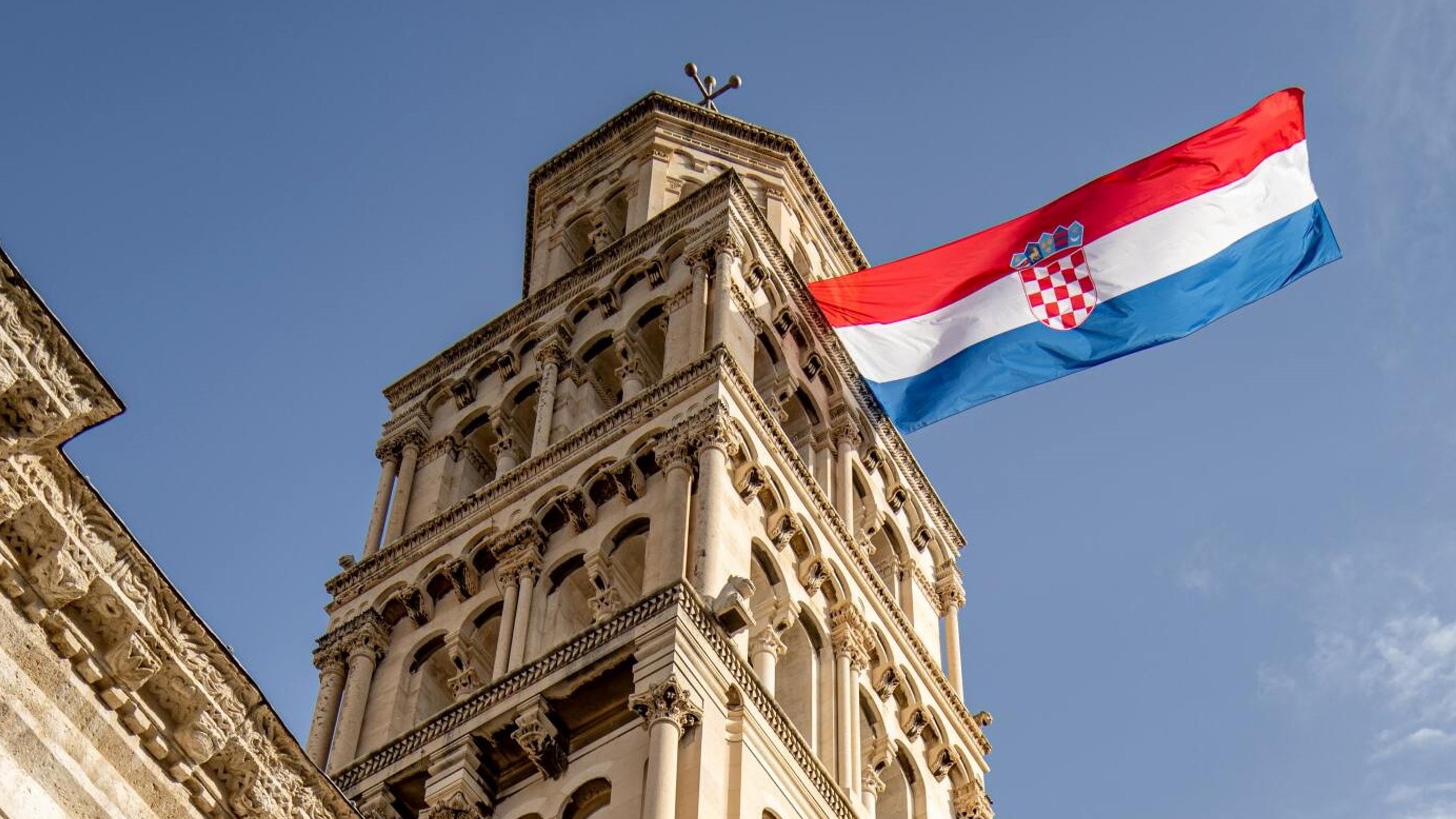 Old building and Croatian flag