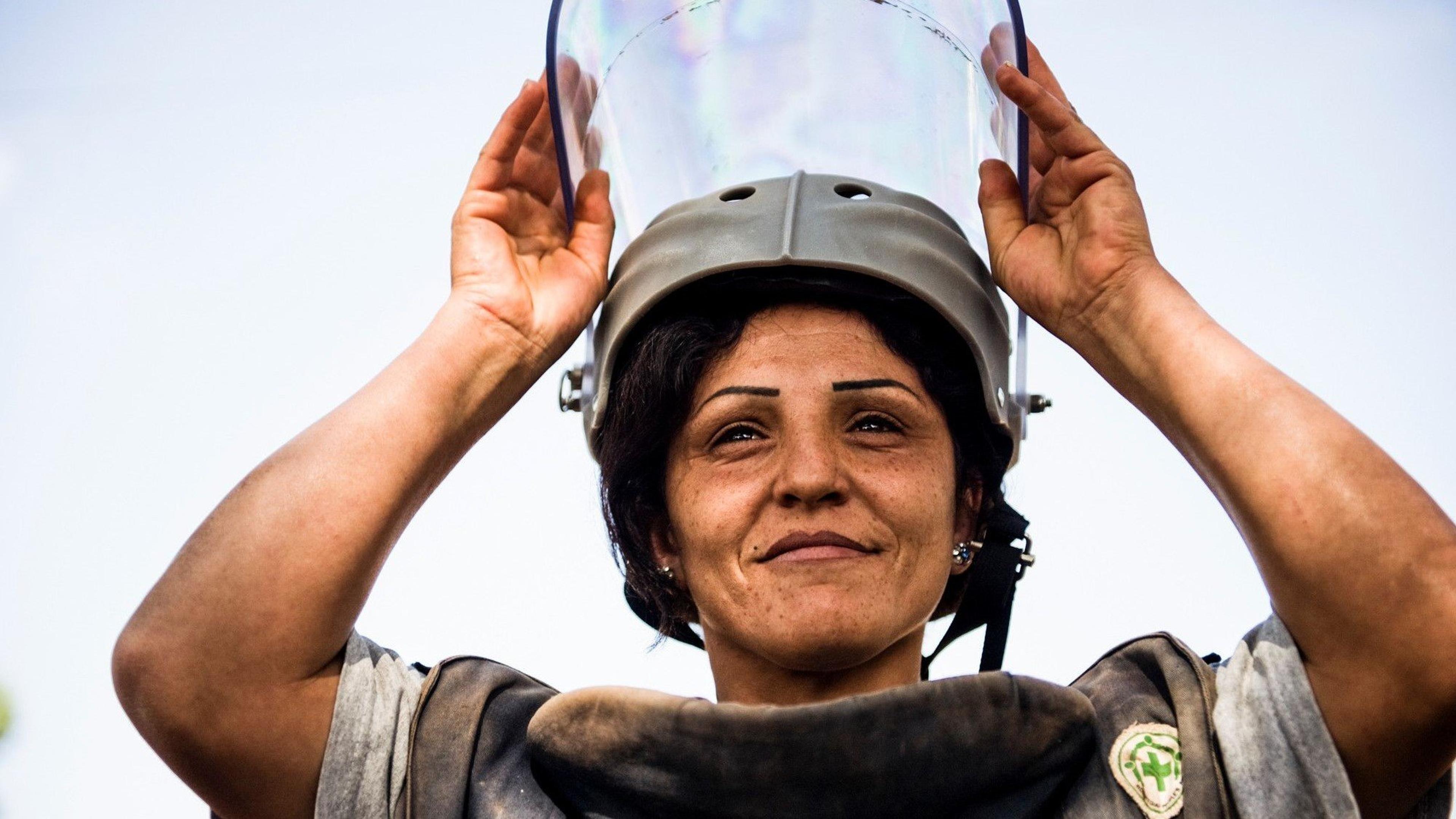 Woman doing mine clearance