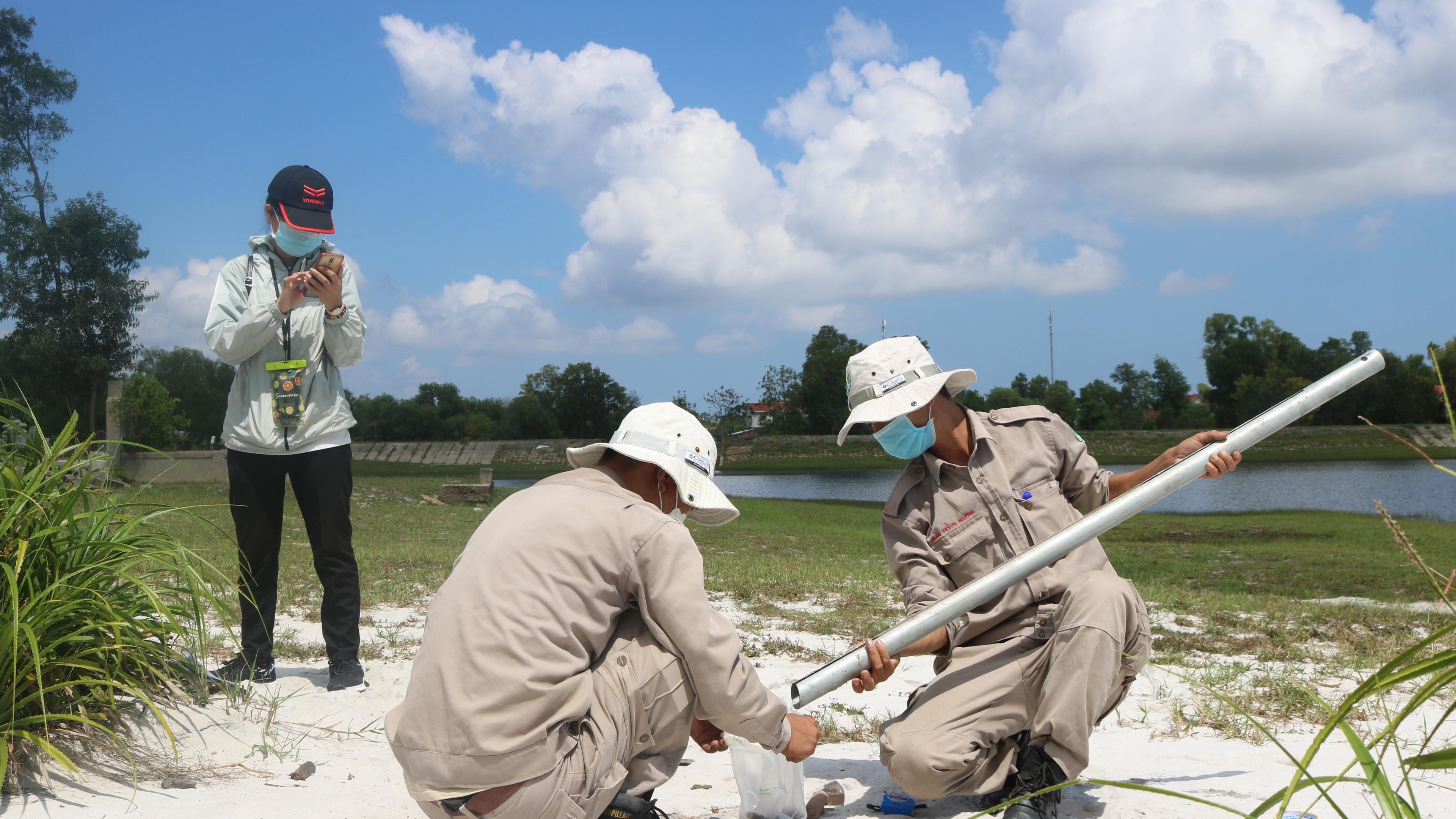 NPA staff doing soil tests in Vietnam