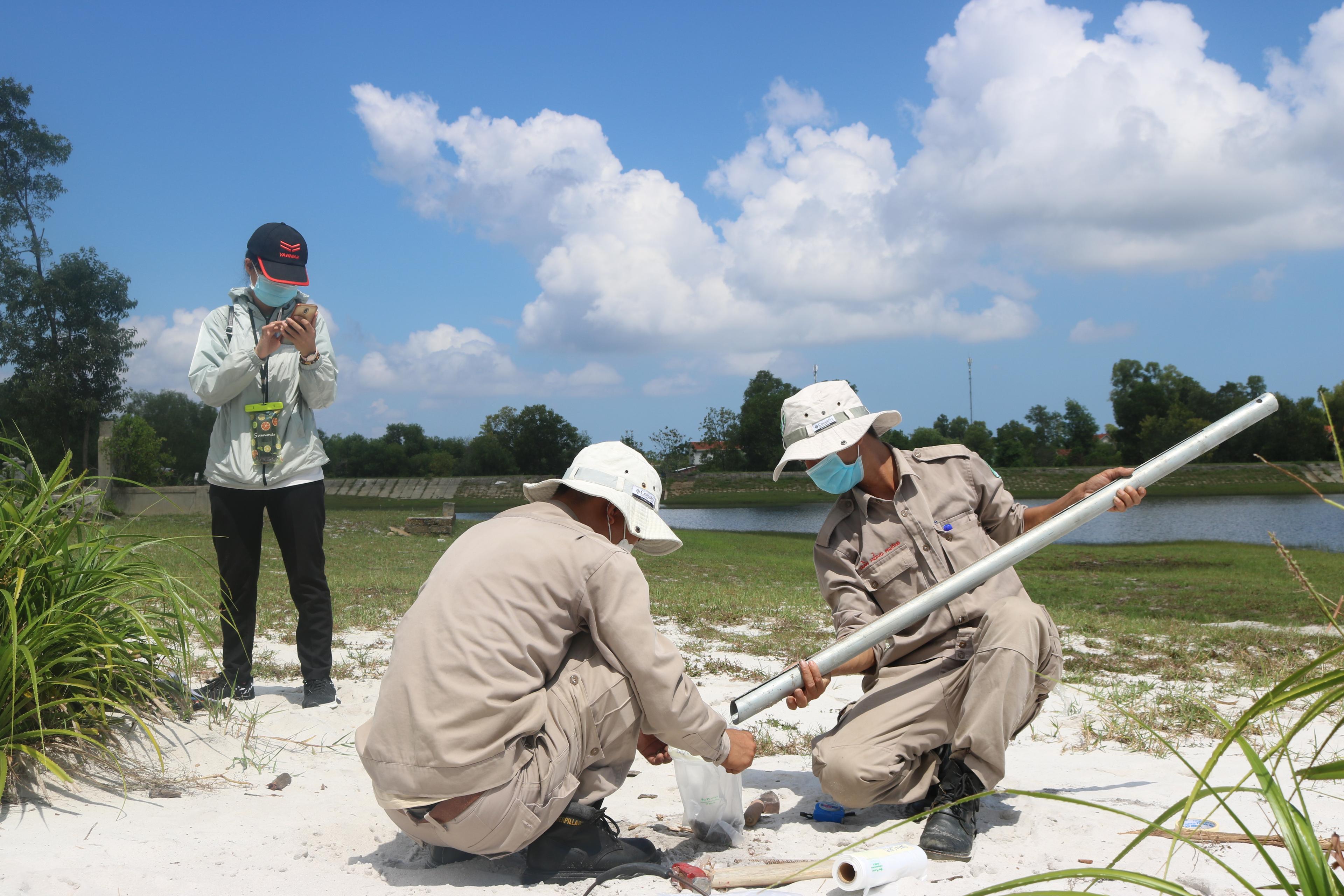 NPA staff doing soil tests in Vietnam