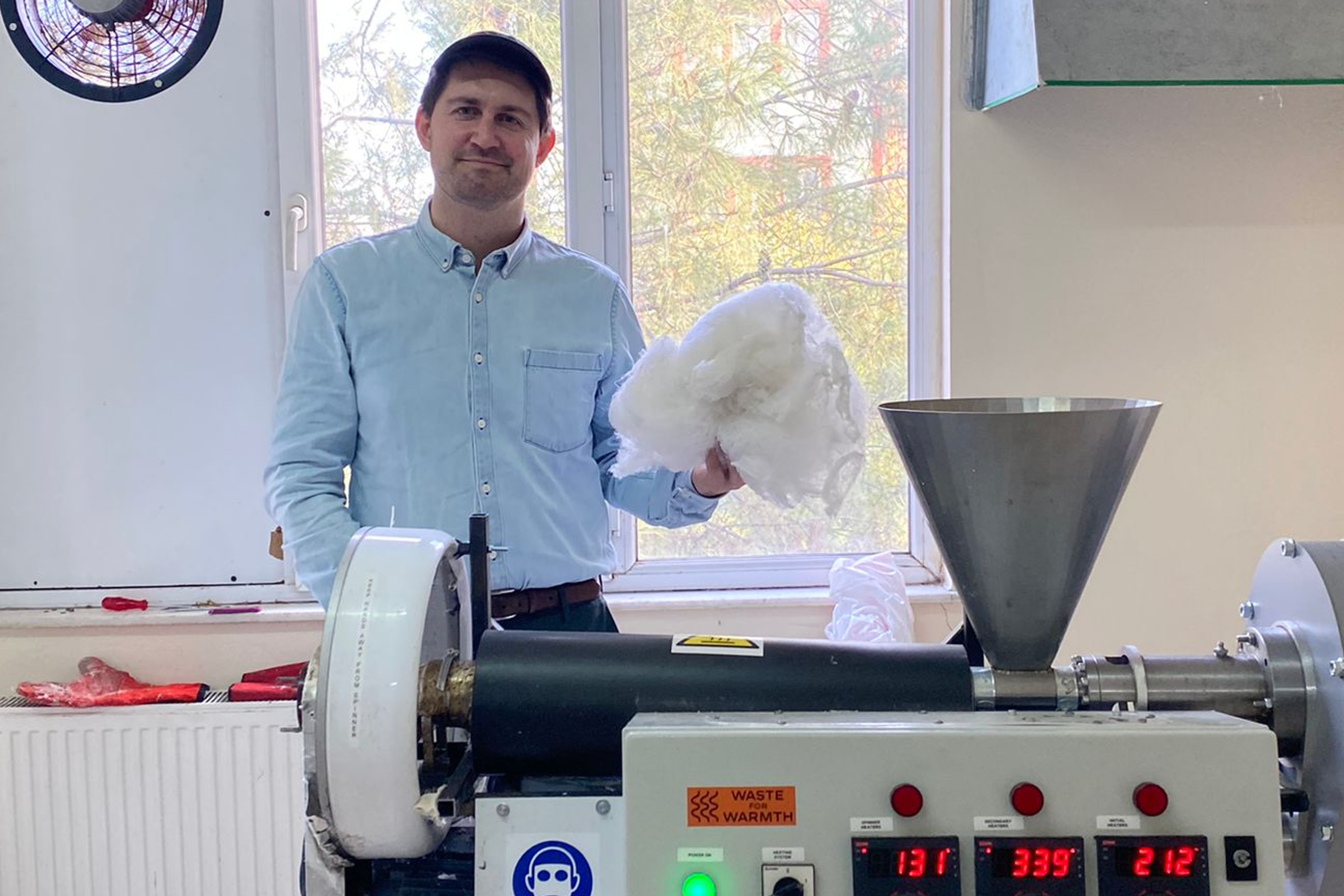 Egil Reksten is the project manager in the Waste for Warmth project led by Engineers Without Borders Norway. Here he is testing the Polyfloss machine that can make tent insulation from plastic waste.