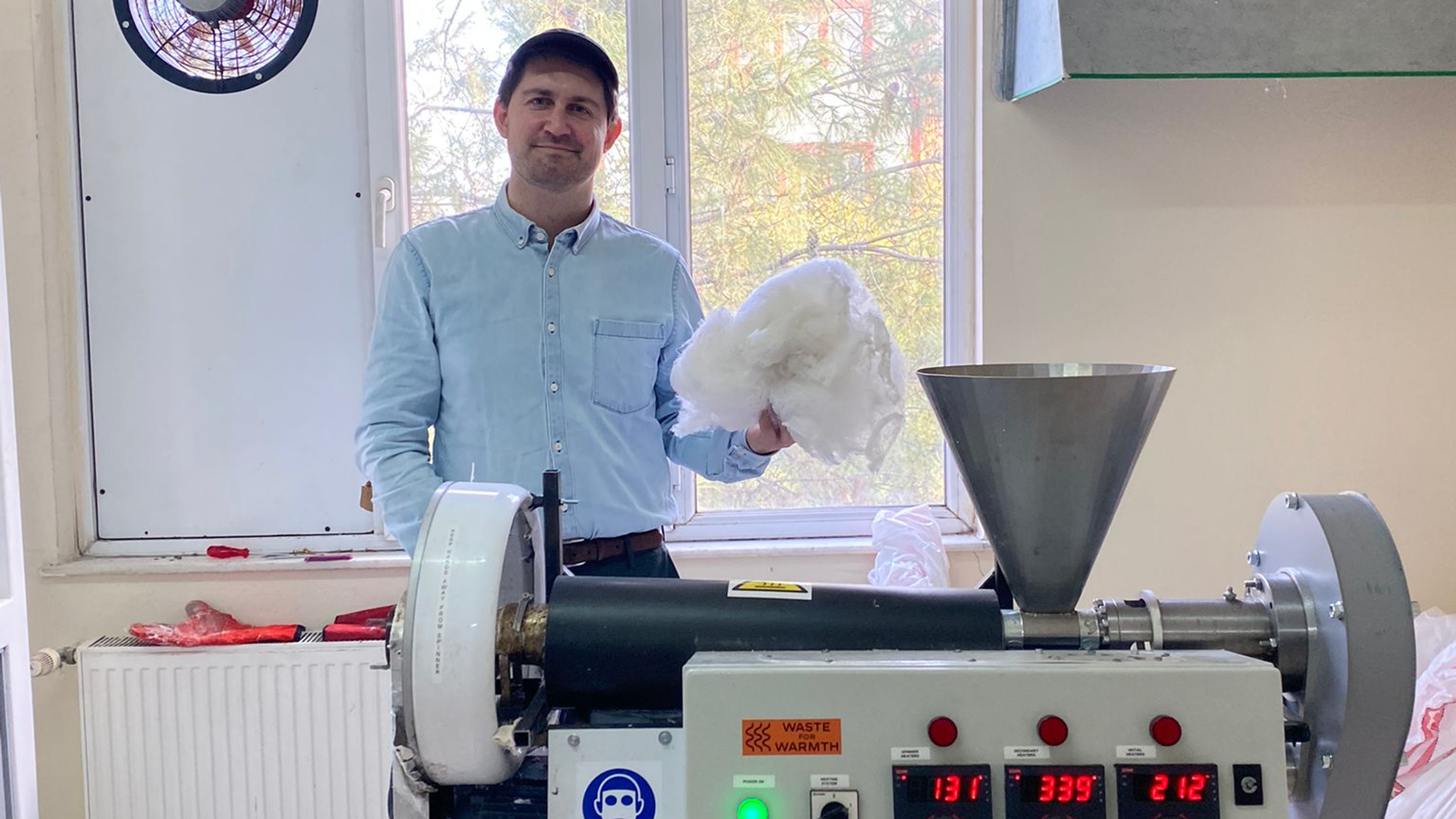 Egil Reksten is the project manager in the Waste for Warmth project led by Engineers Without Borders Norway. Here he is testing the Polyfloss machine that can make tent insulation from plastic waste.