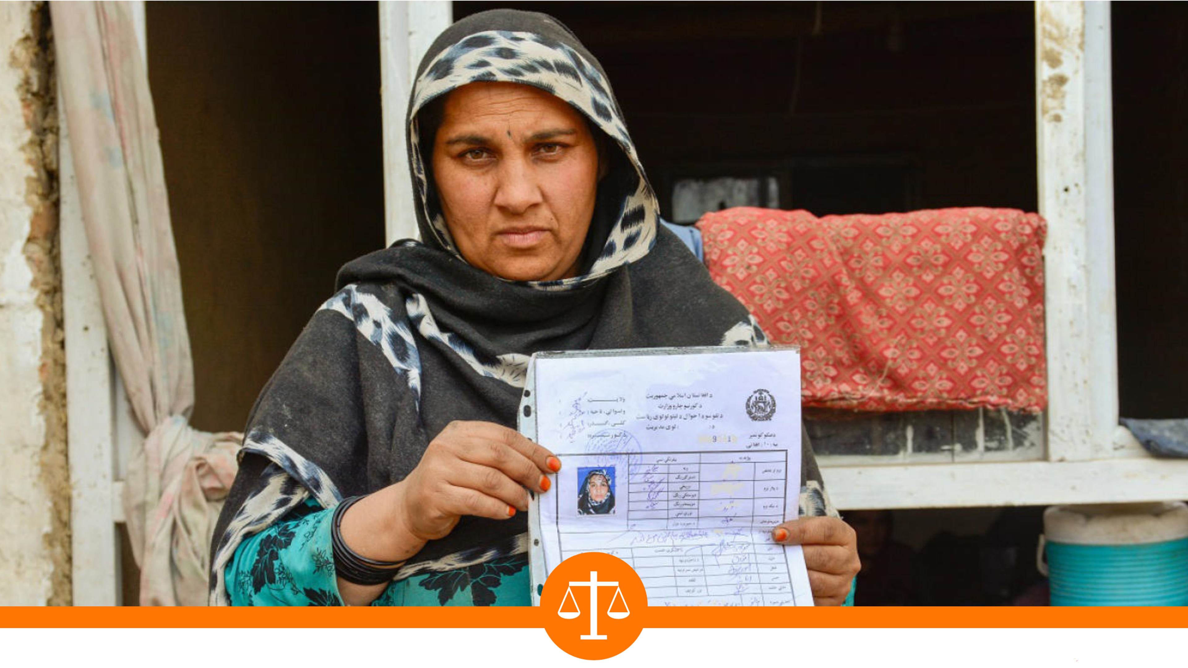 Forty-year-old Zia Gull being helped by NRC to obtain identity document in Kabul, Afghanistan.