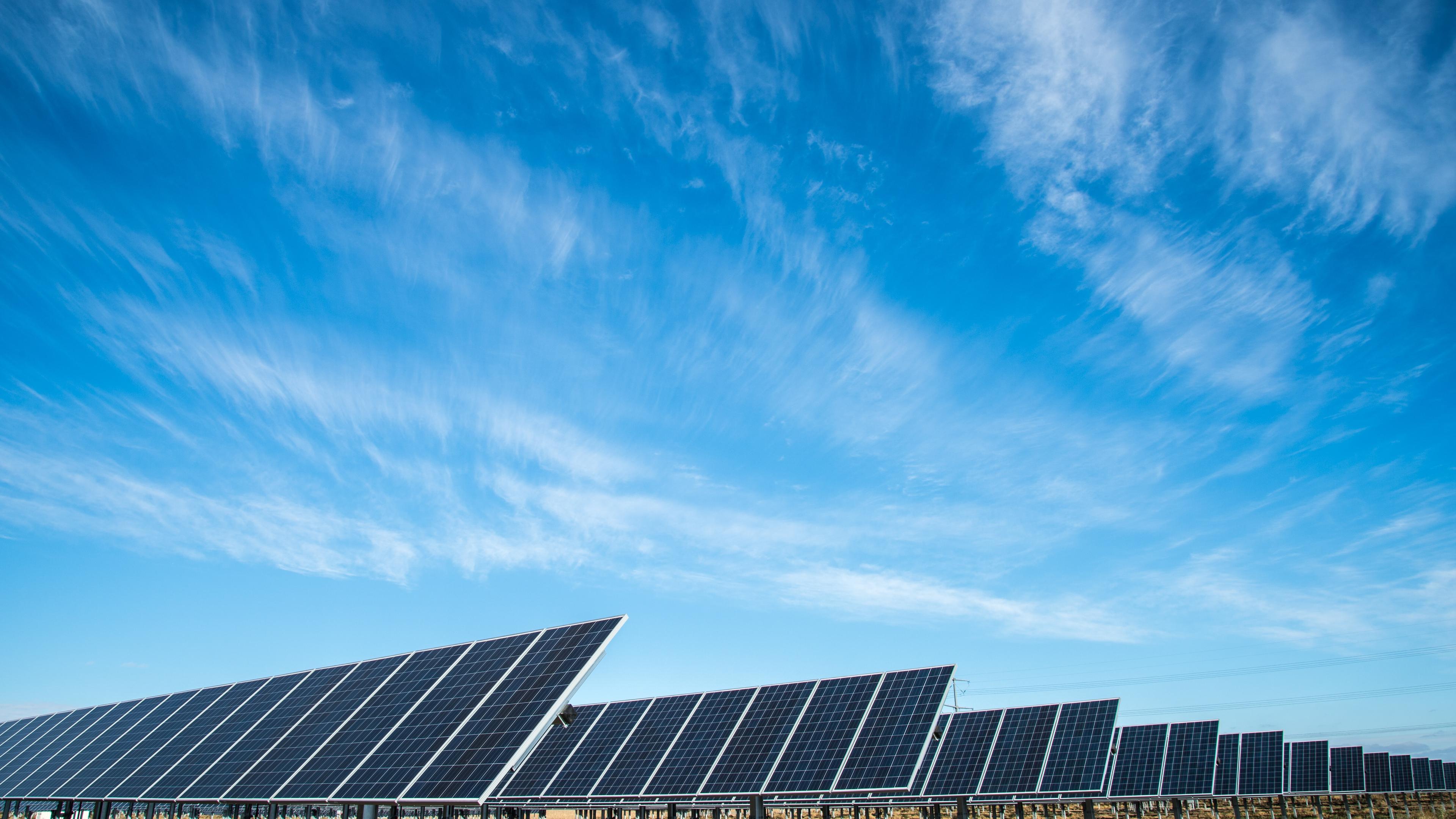 Solar panels under blue sky