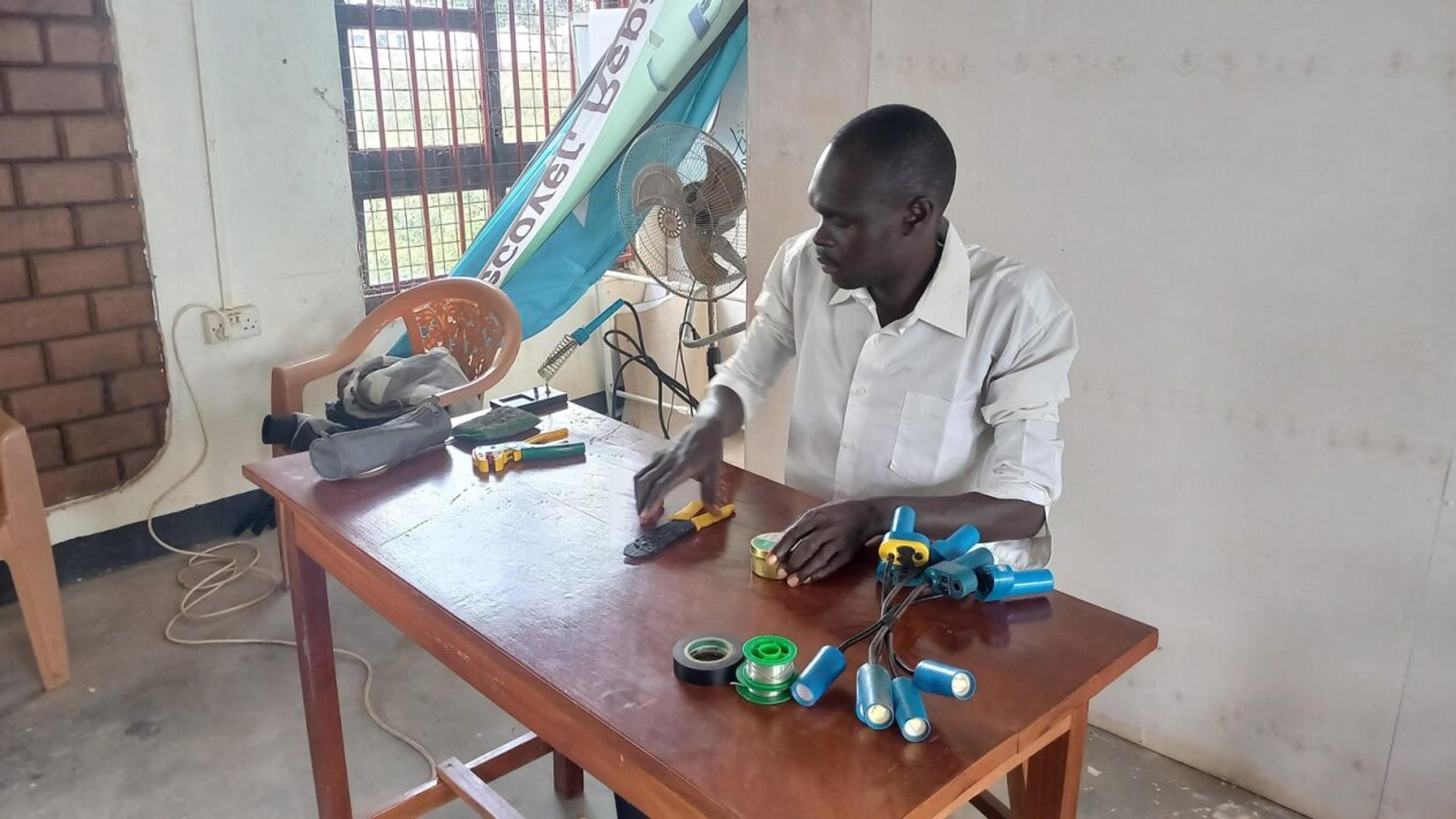 Repair technician working with electronic waste