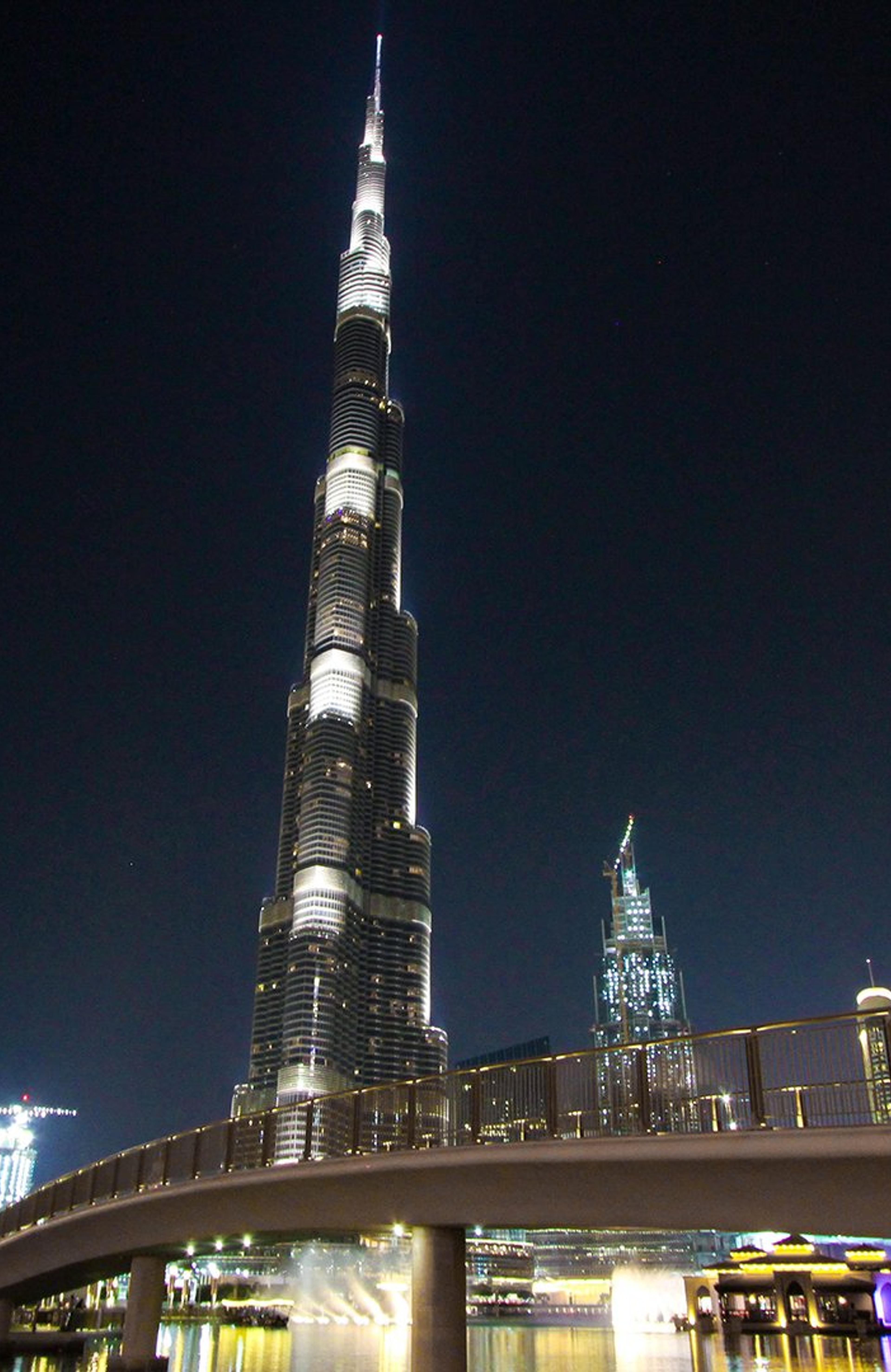 Dubai skyscraper tower in night ligst