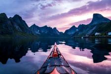 fjords and mountain view from a kayak in Lofoten