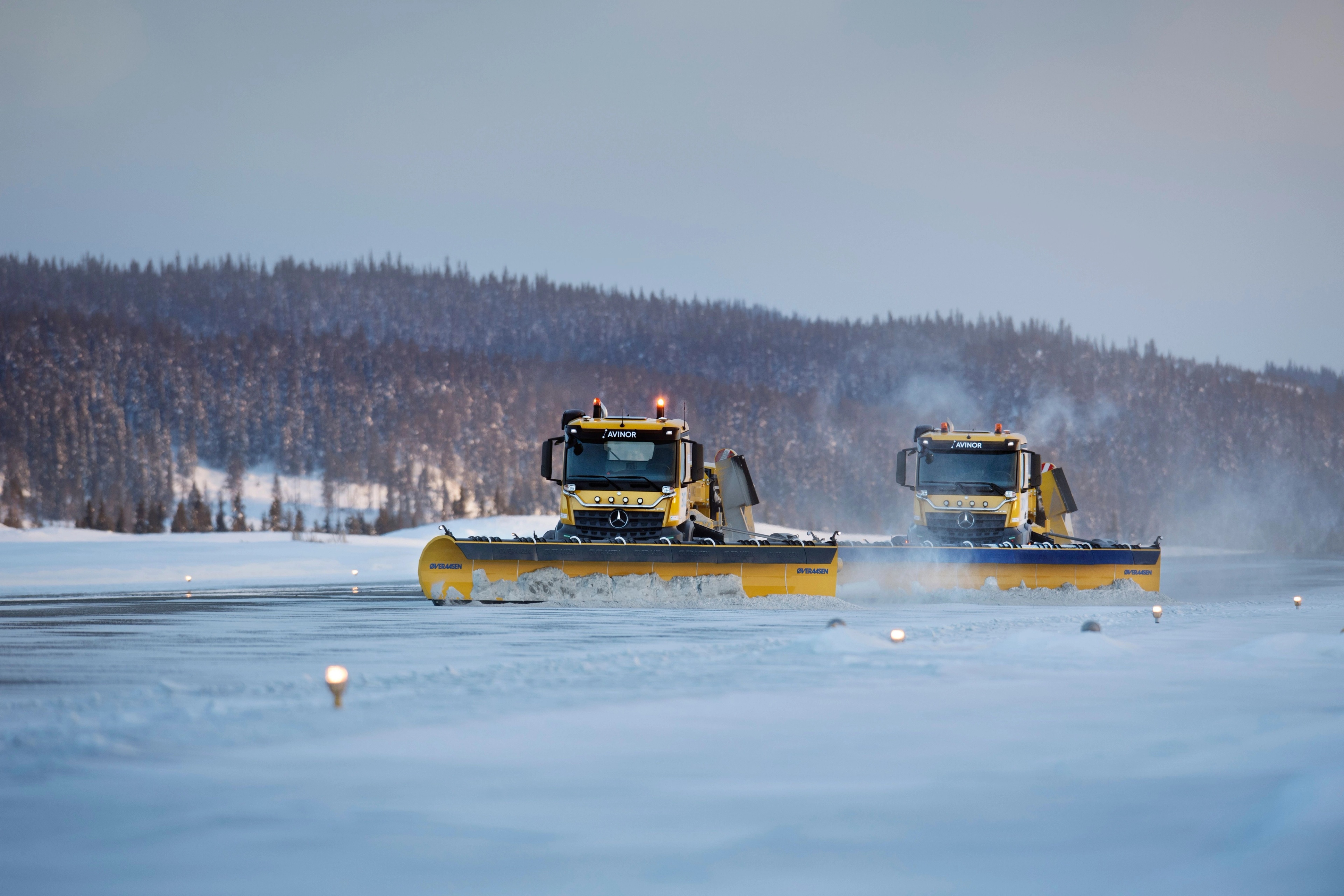 Two snowploughs on a airport