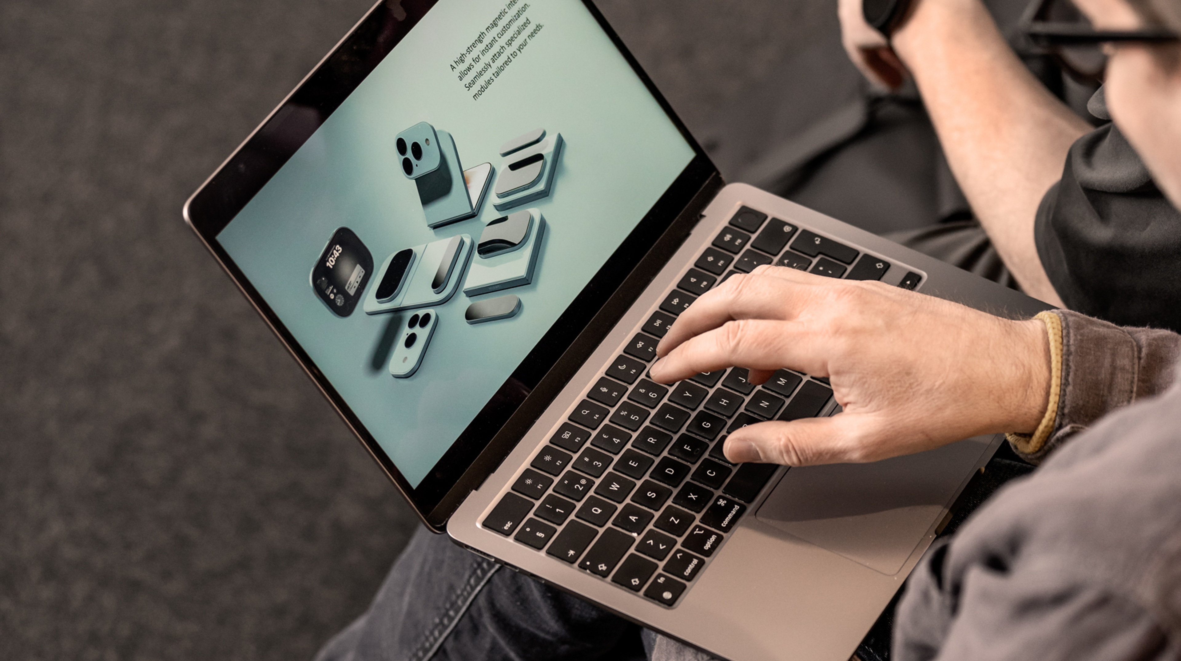 Person holding a phone with AI on the screen