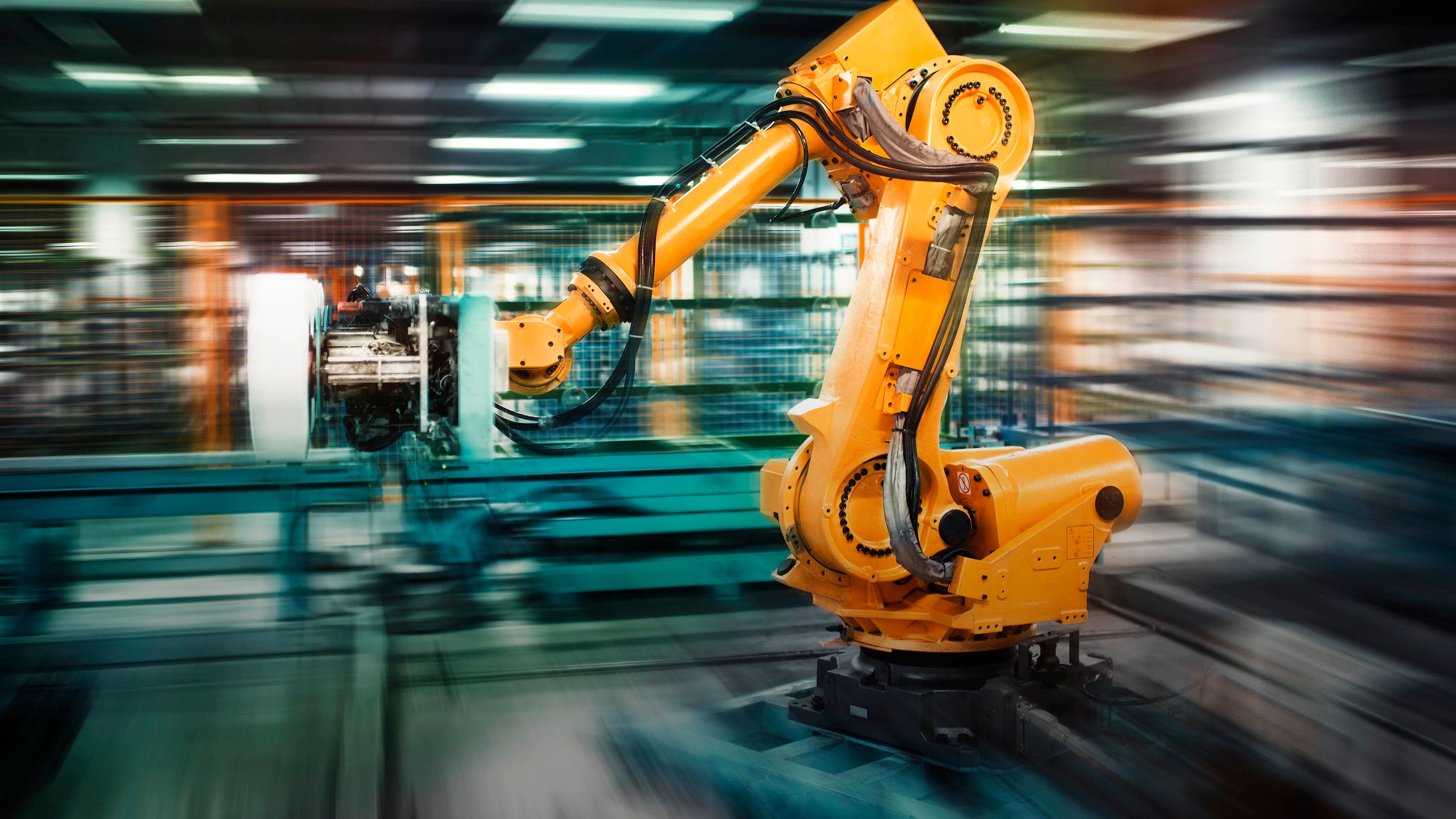 A robotic arm in front of a blurred background