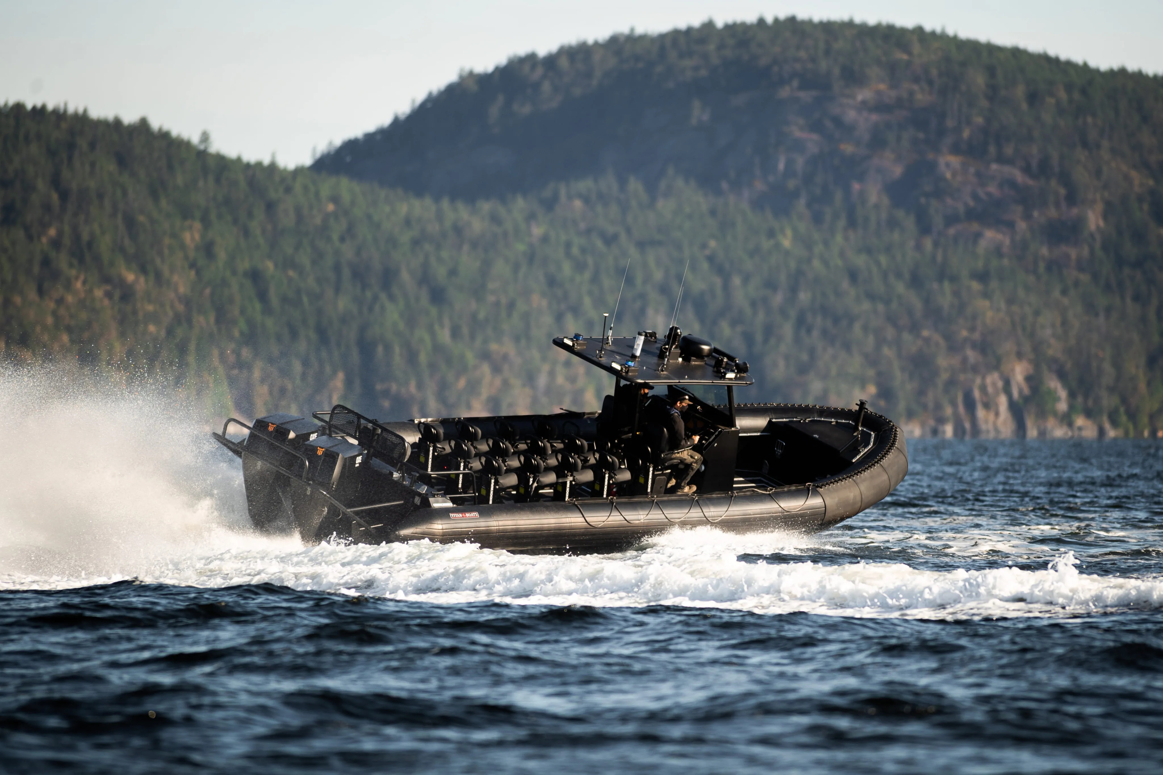Image of a motorboat driving close to the shore